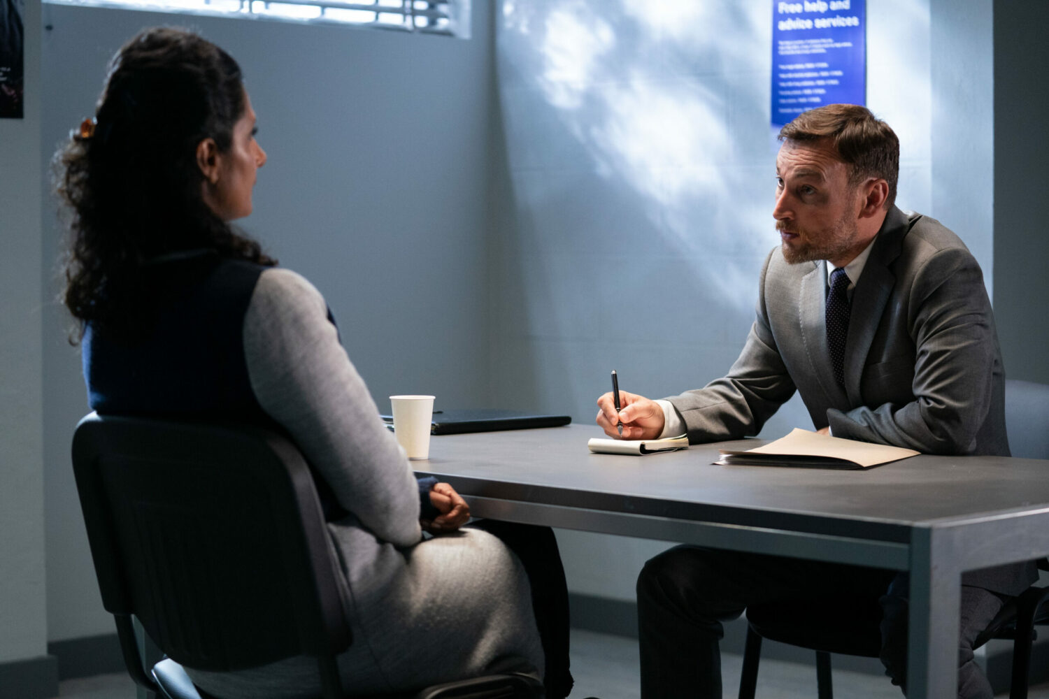 Suki Panesar being questioned at the station