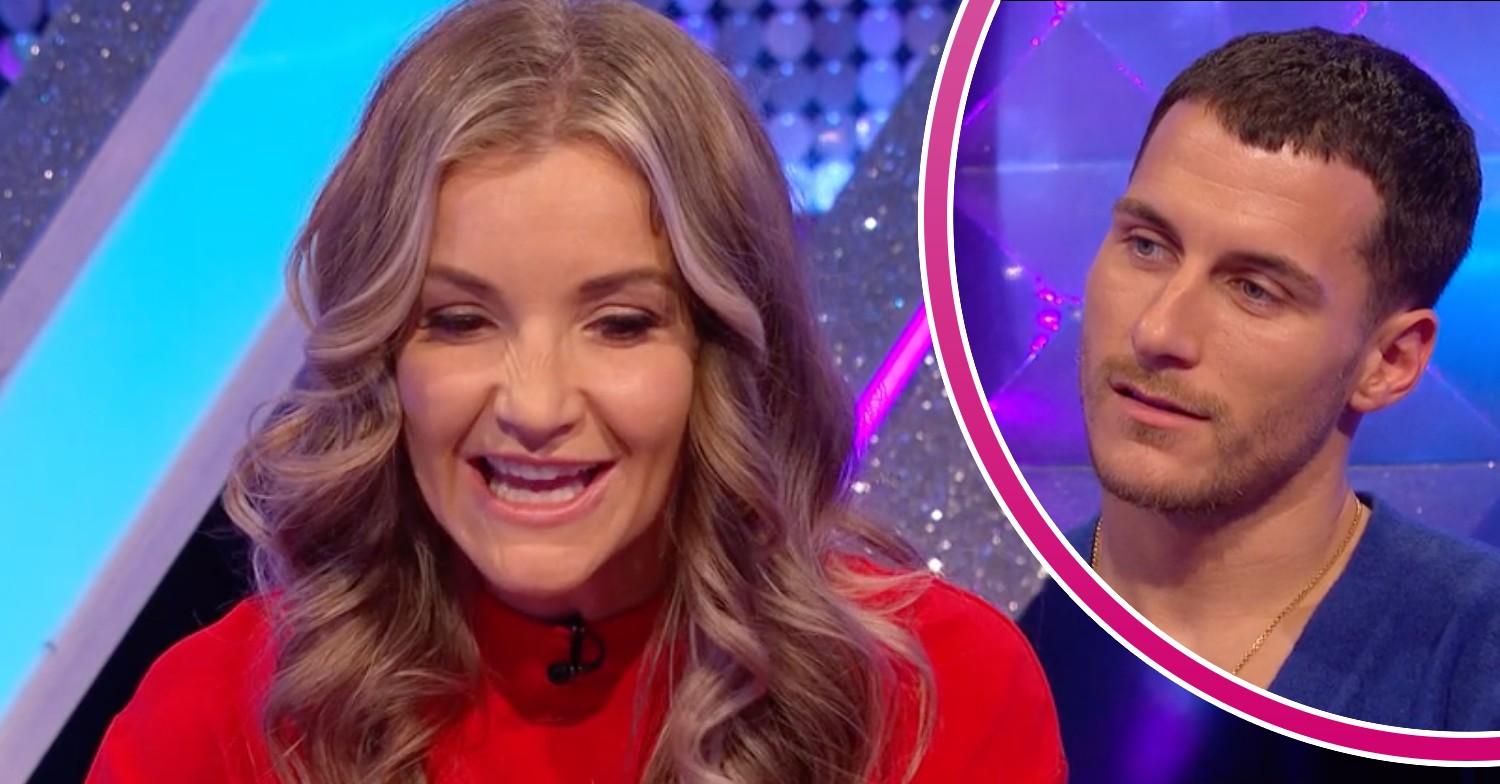 Helen Skelton looks downwards, her Strictly partner Gorka Marquez listens