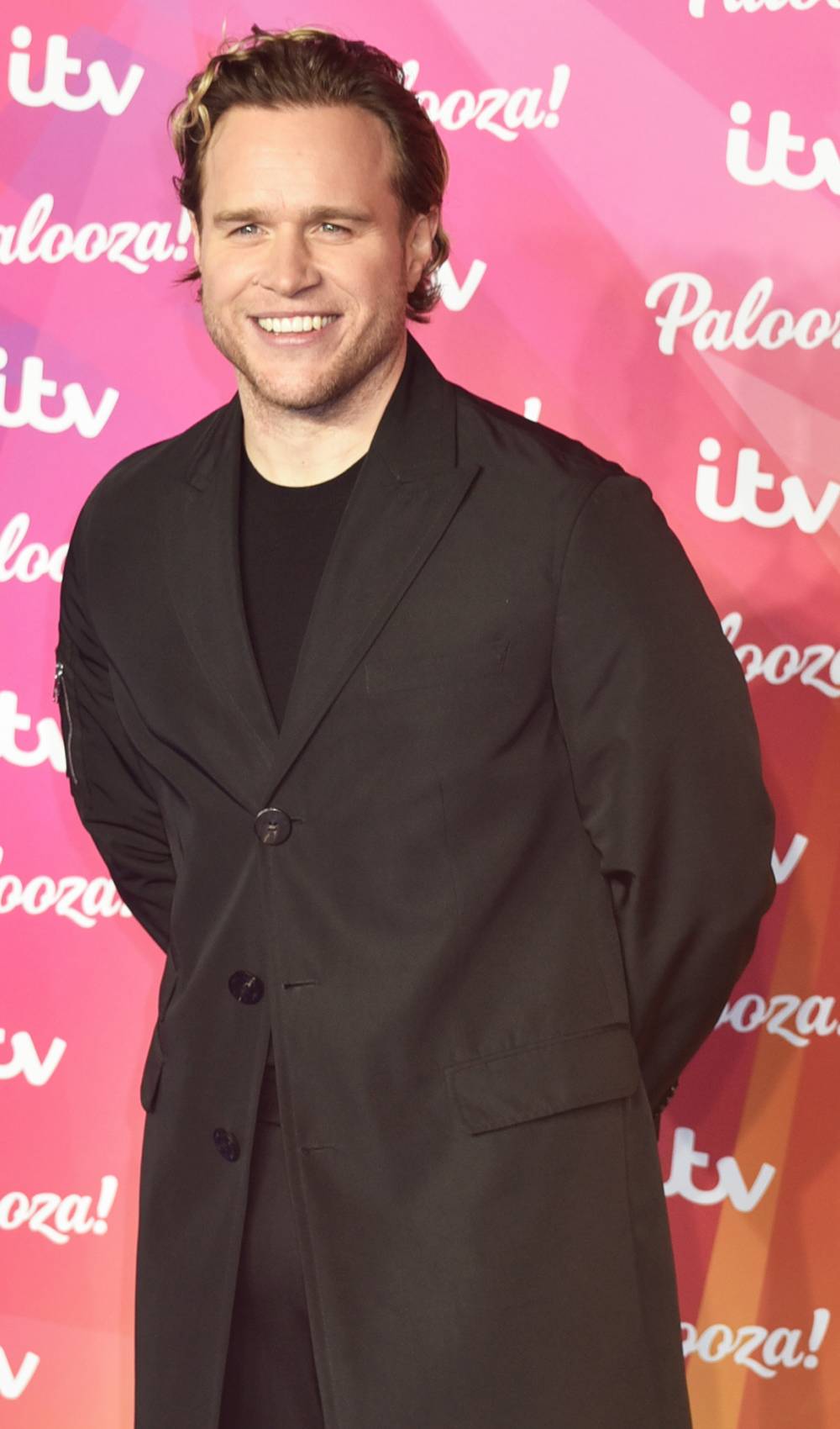 Olly Murs smiles for the cameras