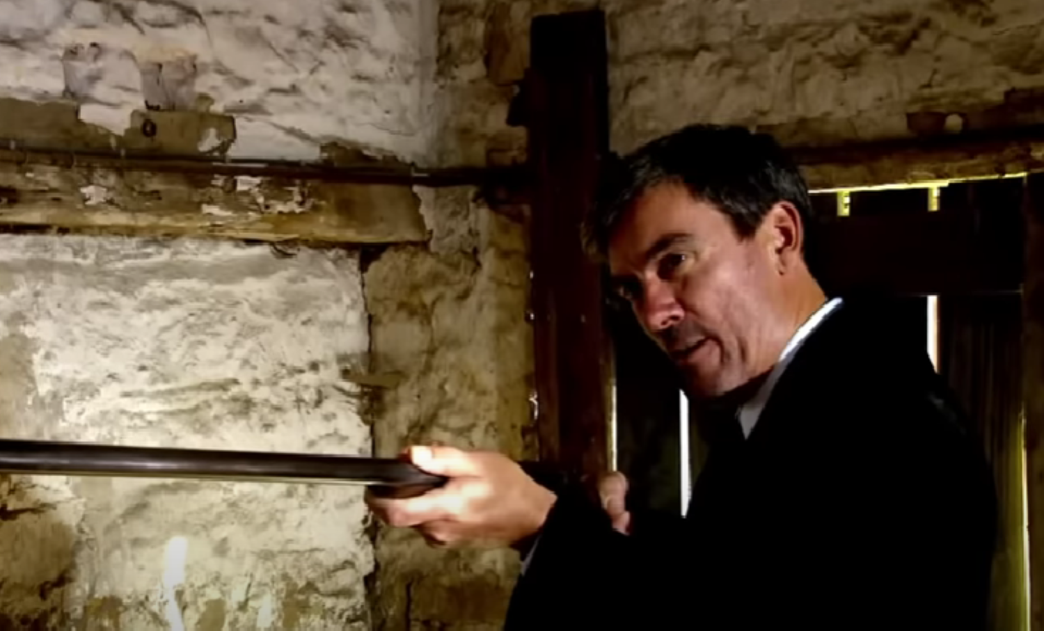 Cain pointing a gun Emmerdale 
