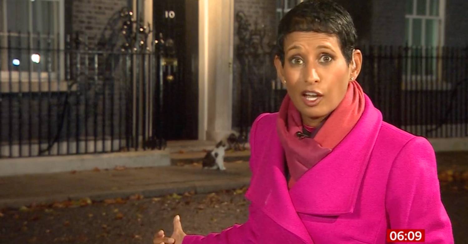 BBC Breakfast host Naga Munchetty cocks her thumb at Larry the cat