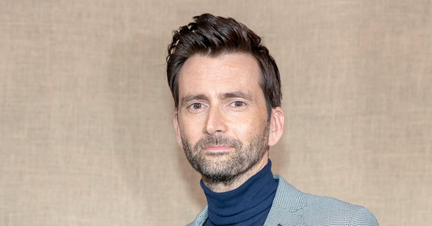 David smiling at the camera