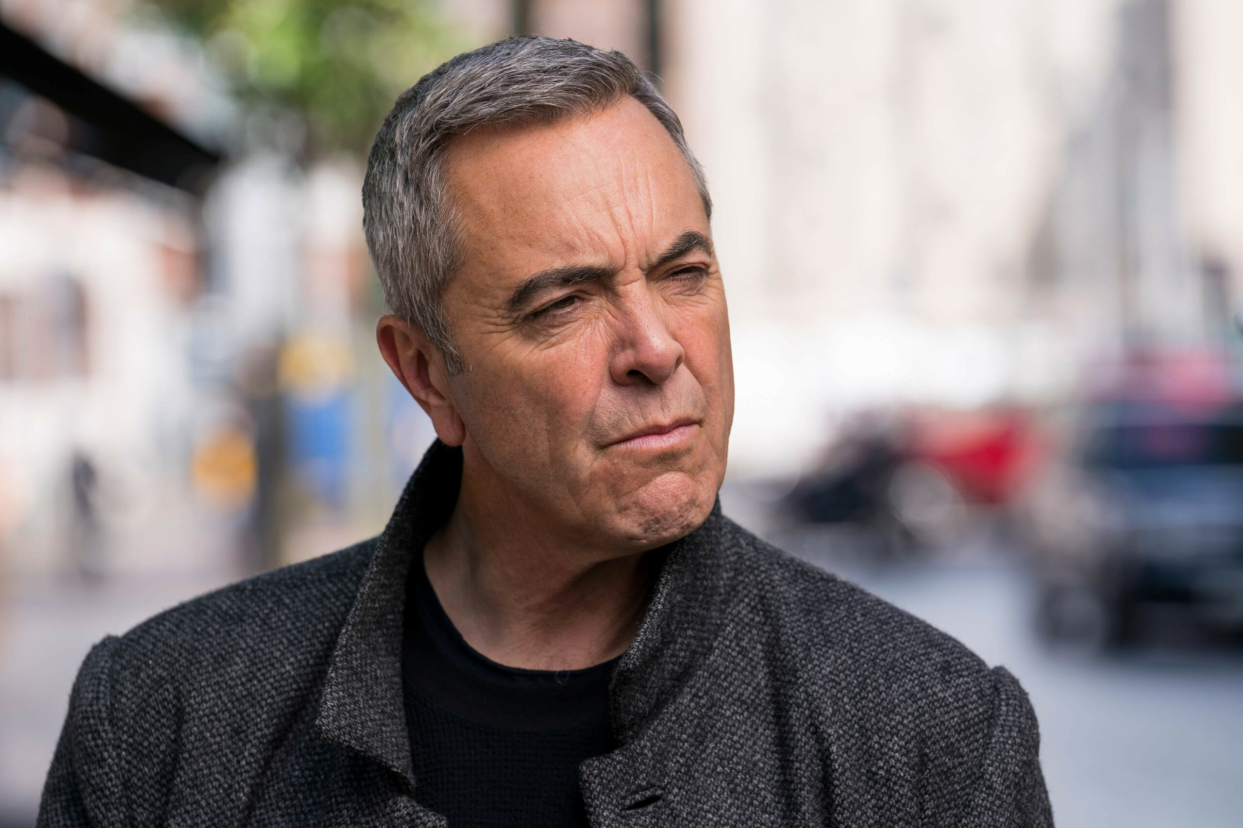 James Nesbitt as Tom Brannick in the Bloodlands finale, he stands outside and looks to his right with an annoyed expression