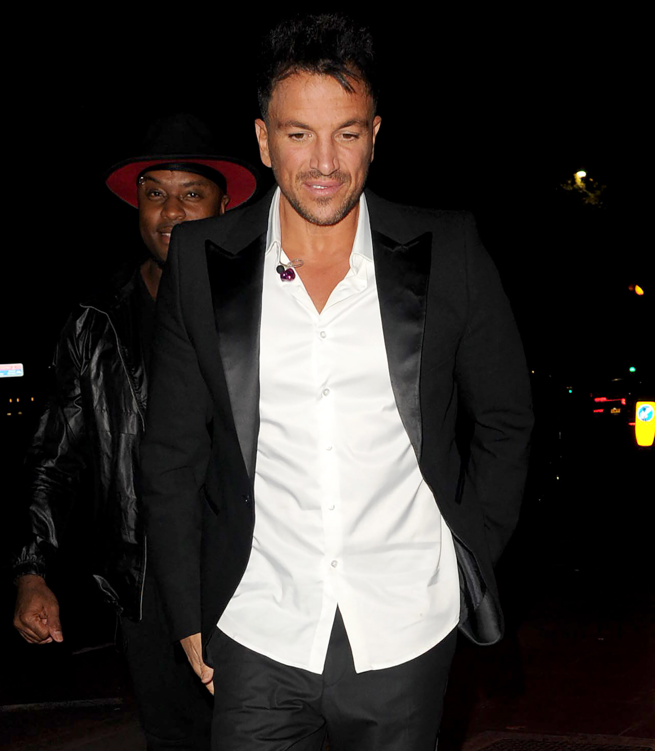 Peter Andre looking down smiling