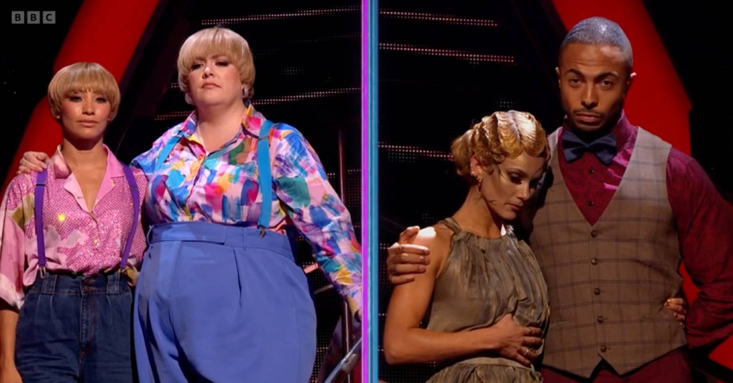 Dianne Buswell puts her hand on her stomach on Strictly