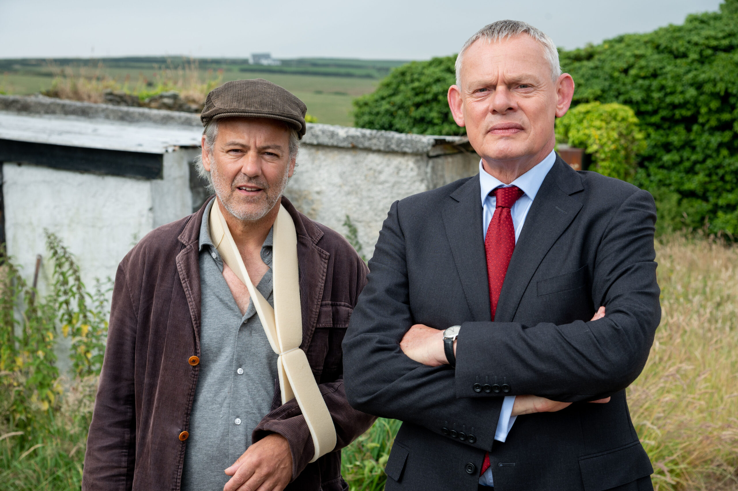 Rupert Graves standing with Martin Clunes in Doc Martin