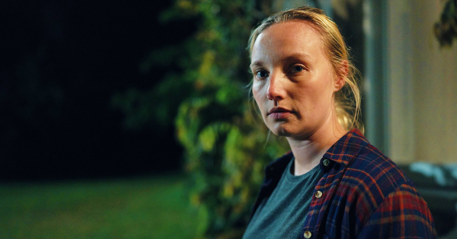 Kayla (Kristy Phillips) in character in The Pact series 2 looking troubled