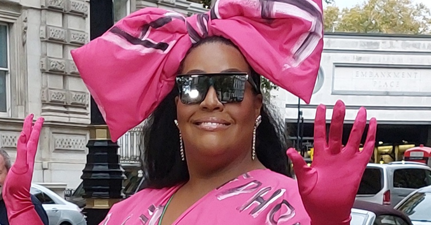 Alison Hammond posing in a pink OTT outfit