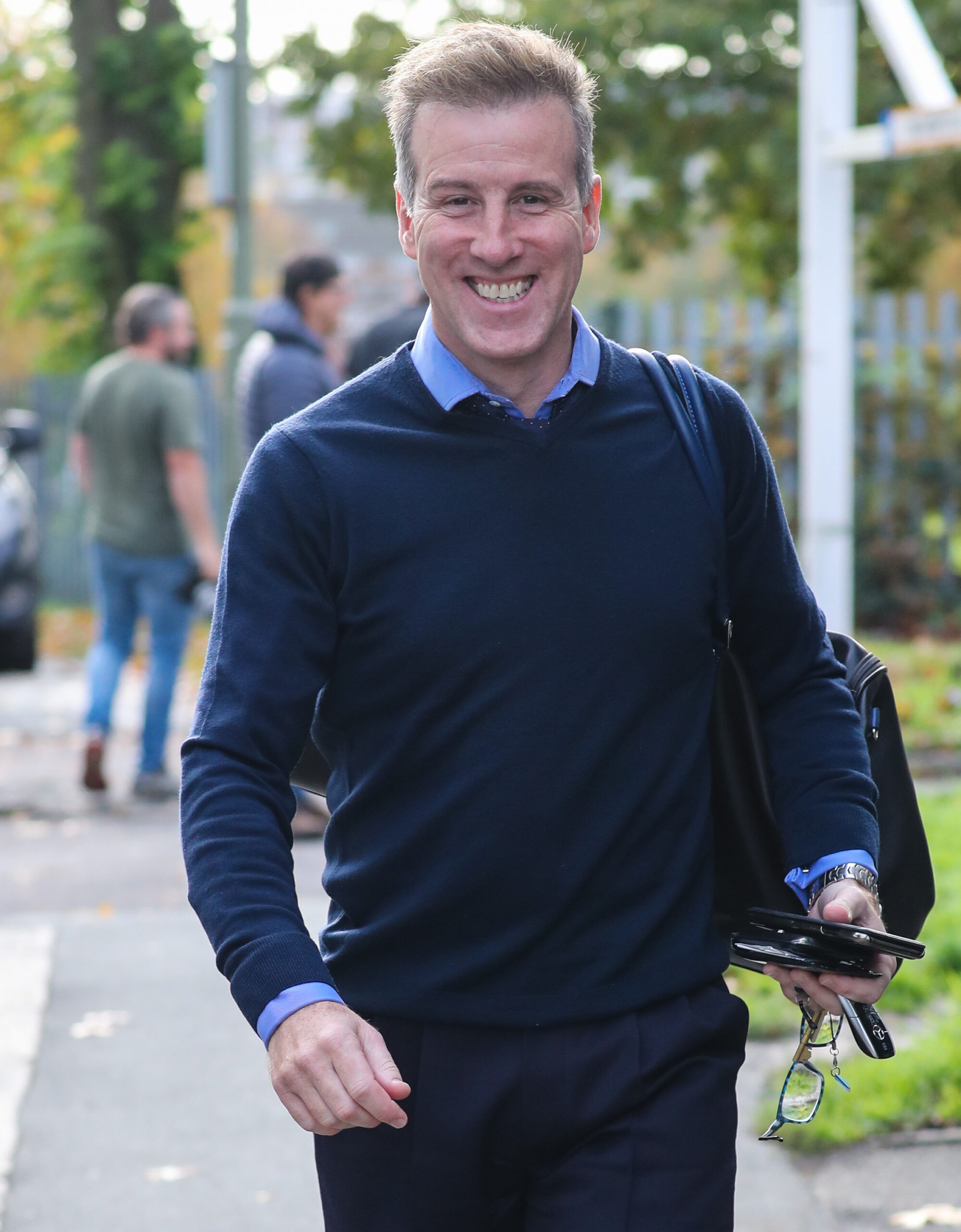 Anton Du Beke wearing navy and smiling