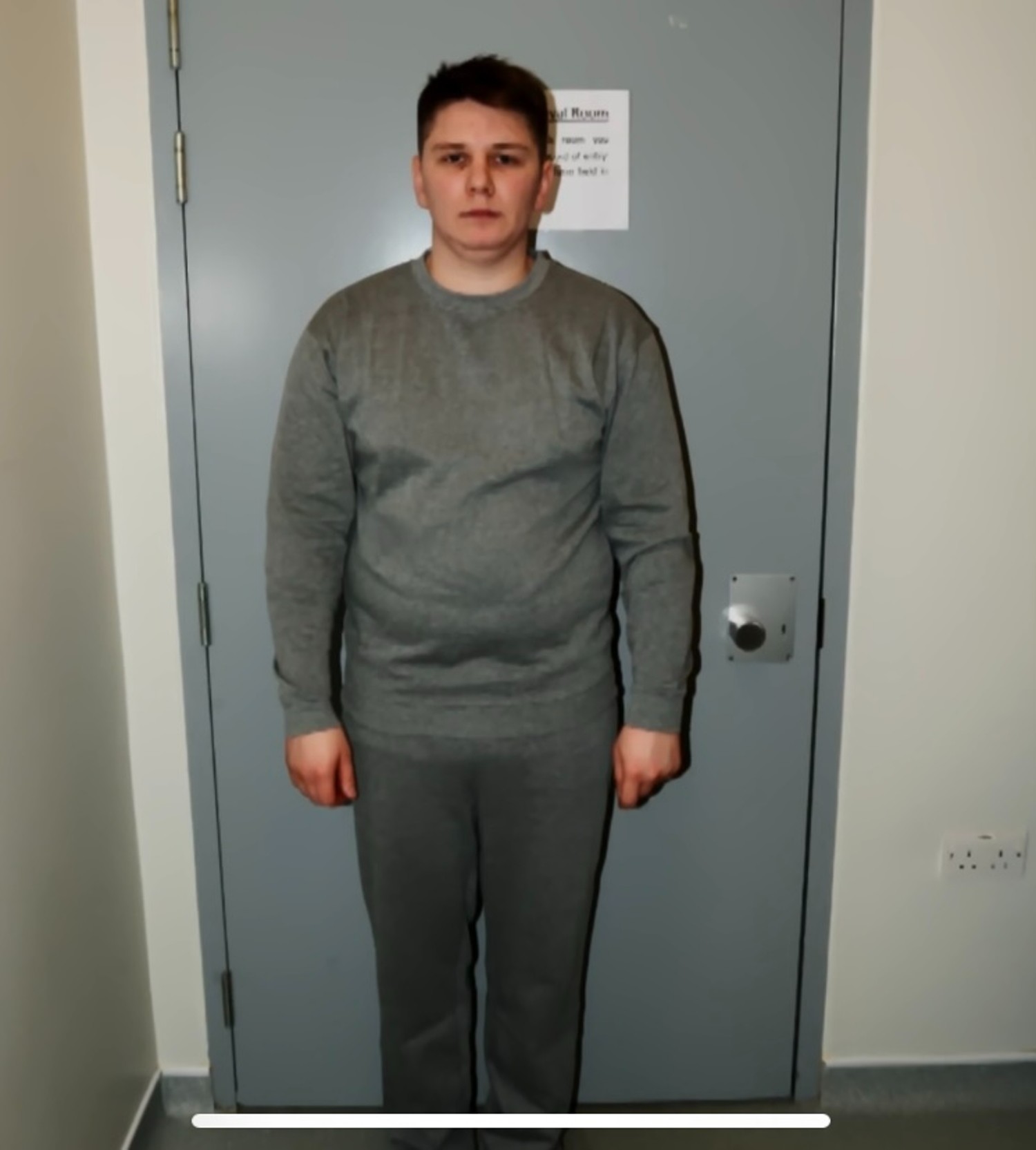 Pawel Relowicz standing in grey sweats