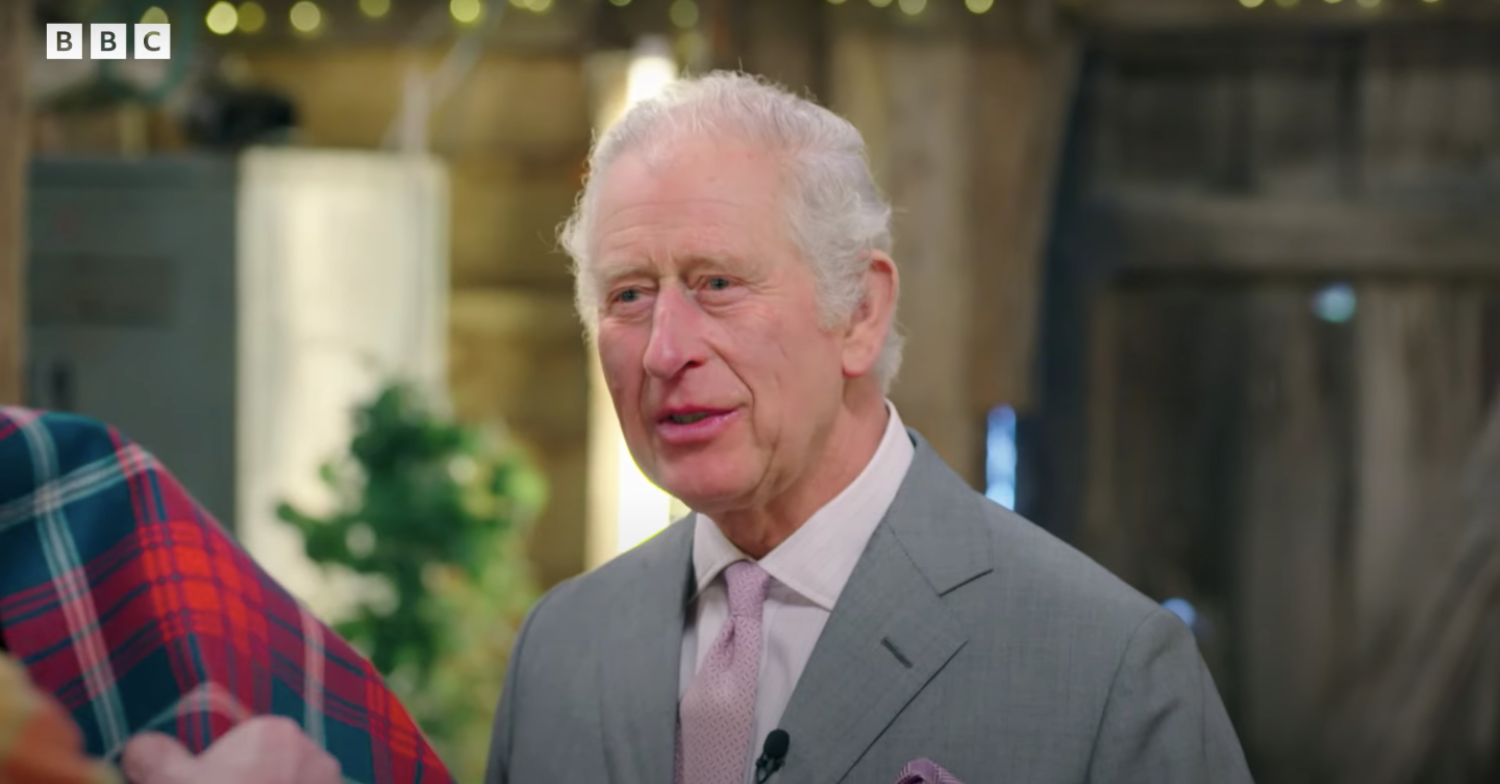 King Charles talking to someone during an episode of The Repair Shop