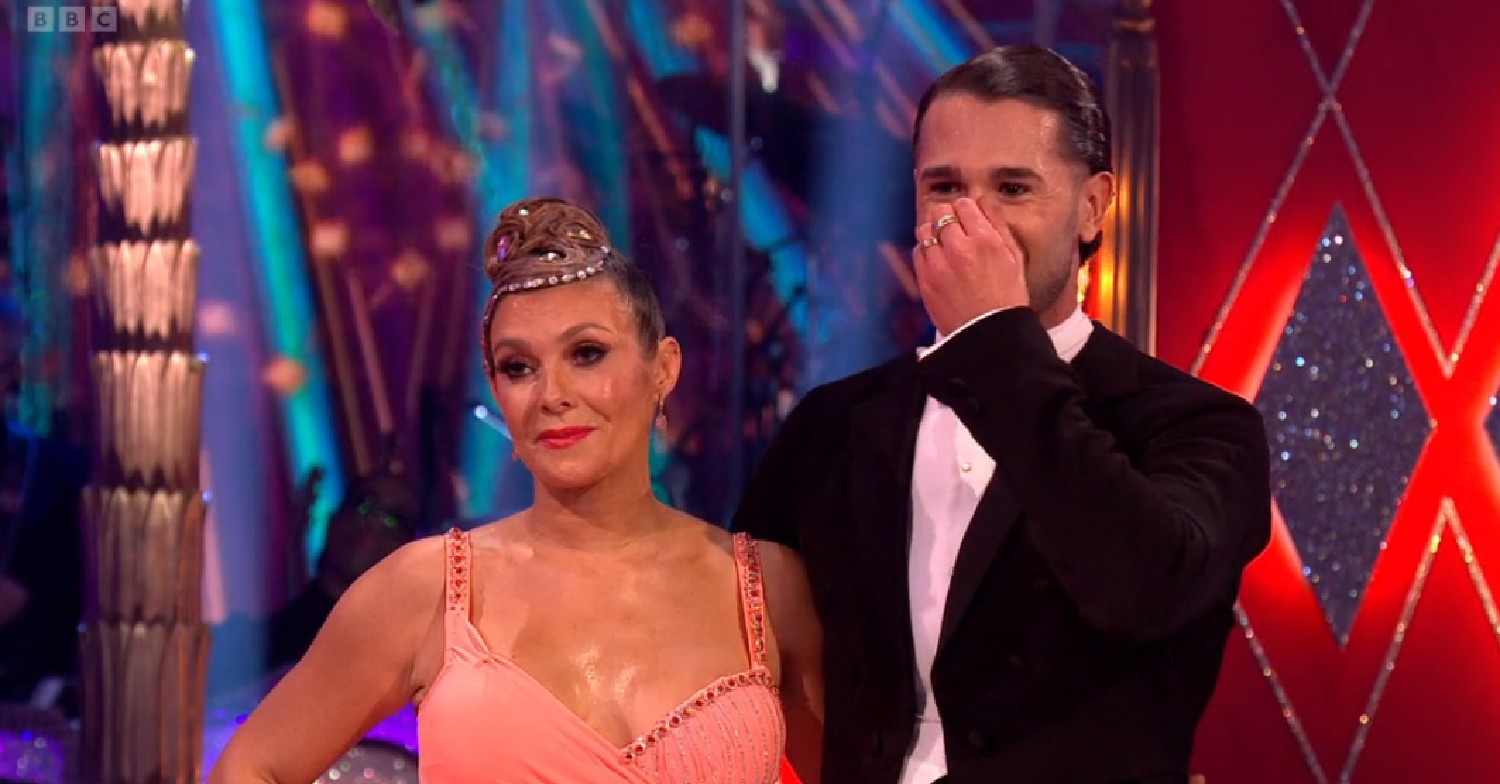 Kym Marsh smiling and Graziano covering his face on Strictly