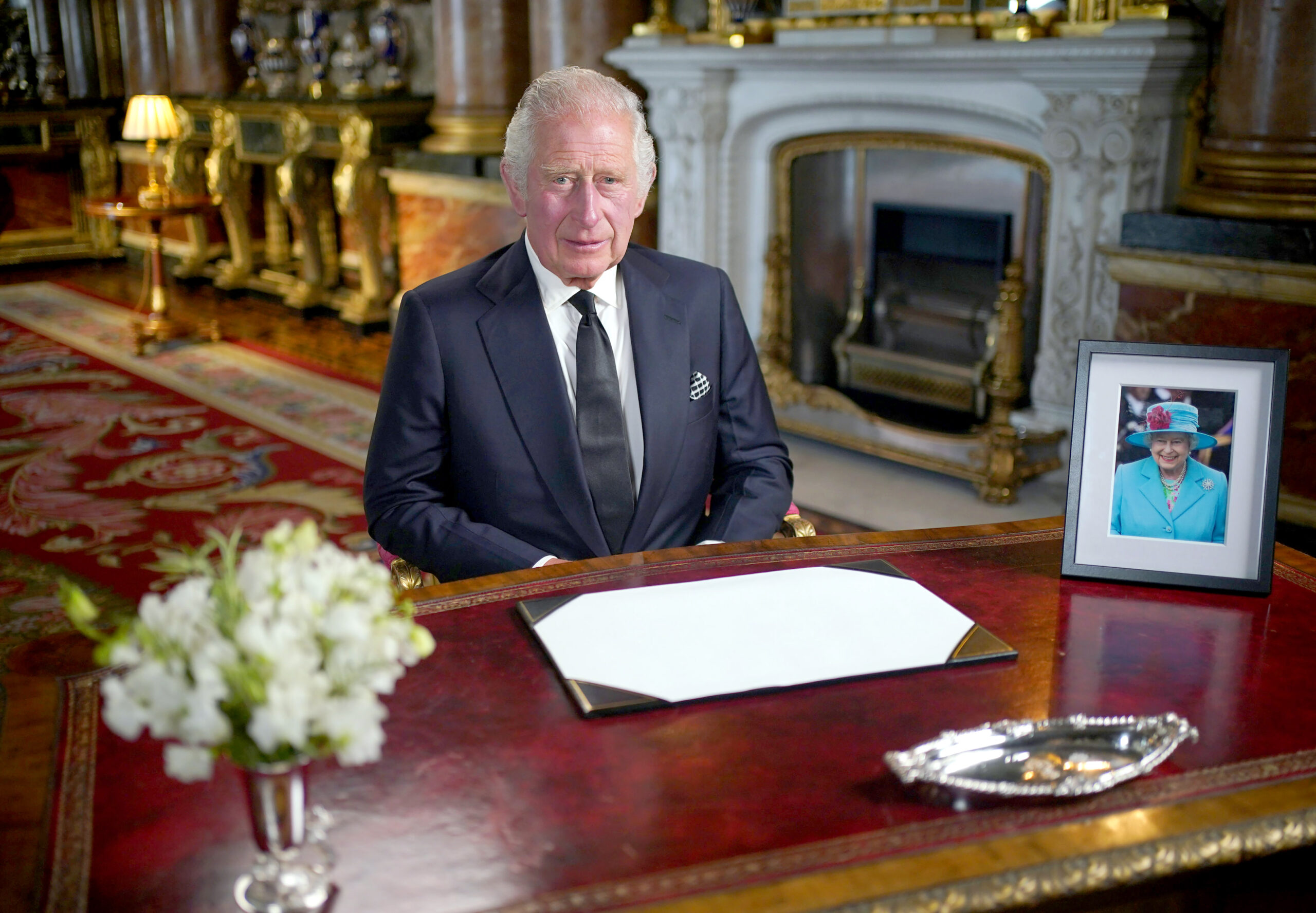 King Charles III delivers his address to the Nation and the Commonwealth from Buckingham Palace