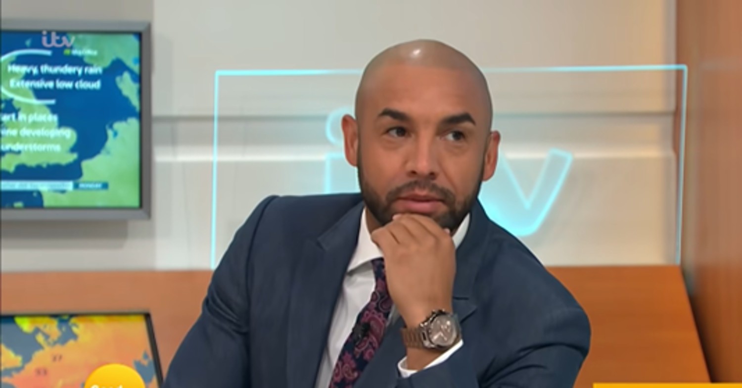 Alex Beresford resting his head on his hand on GMB