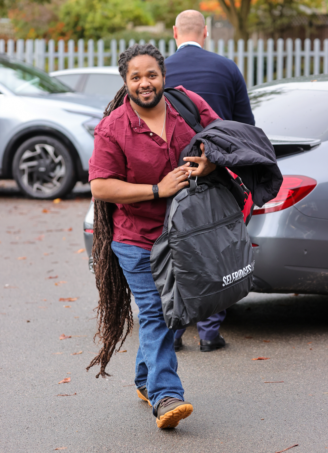 Hamza Yassin smiles as he arrives at Strictly rehearsals