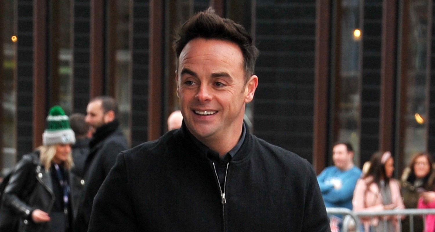 Ant McPartlin smiling in a black shirt