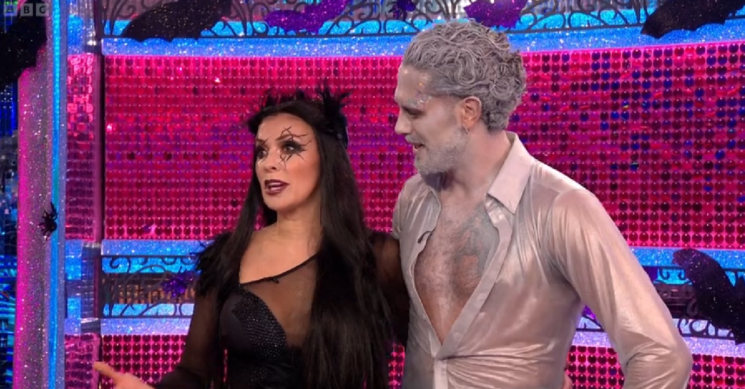 Kym Marsh speaking as Graziano Di Prima looks at her on Strictly