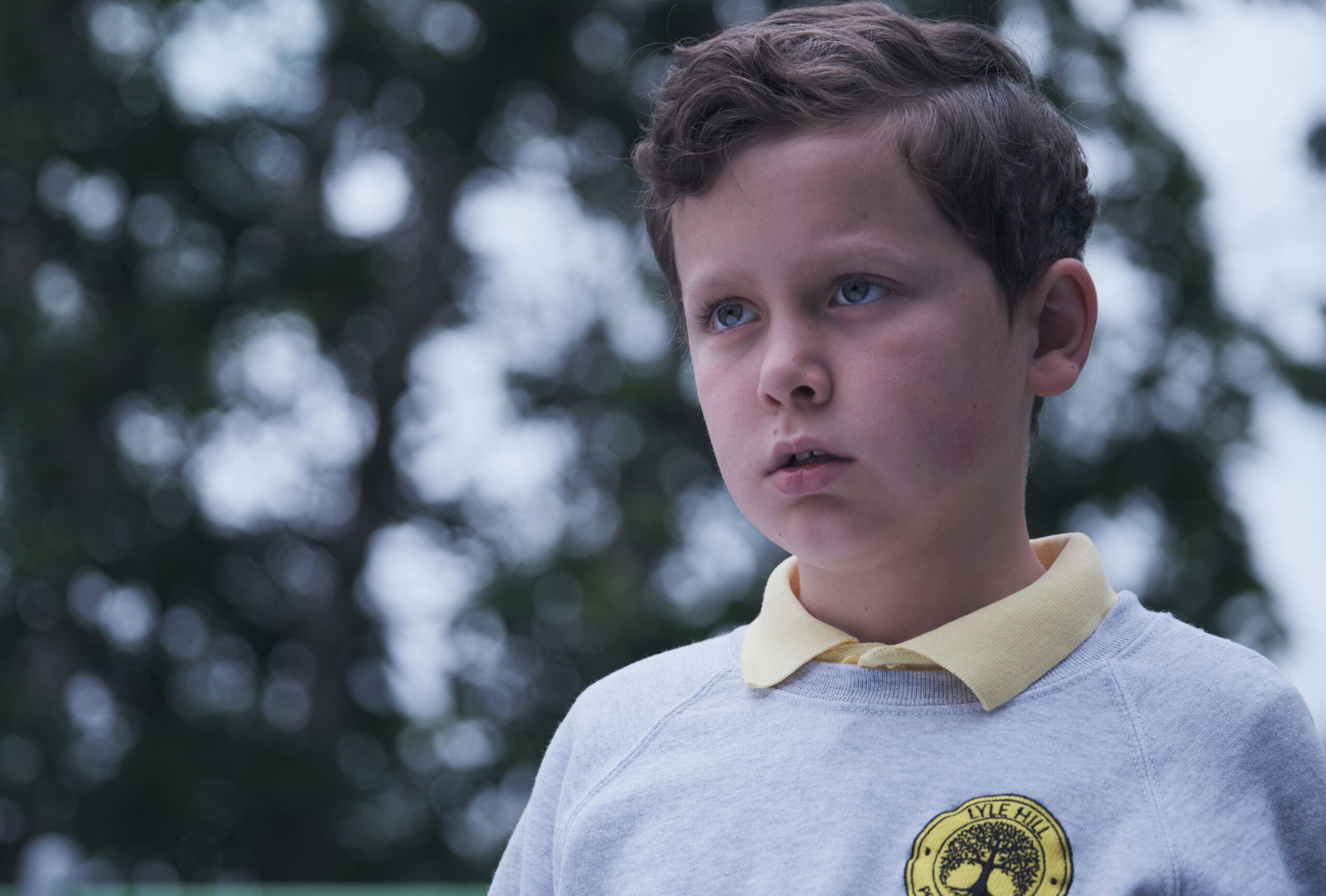 Isaac looks angry outside in The Devil's Hour