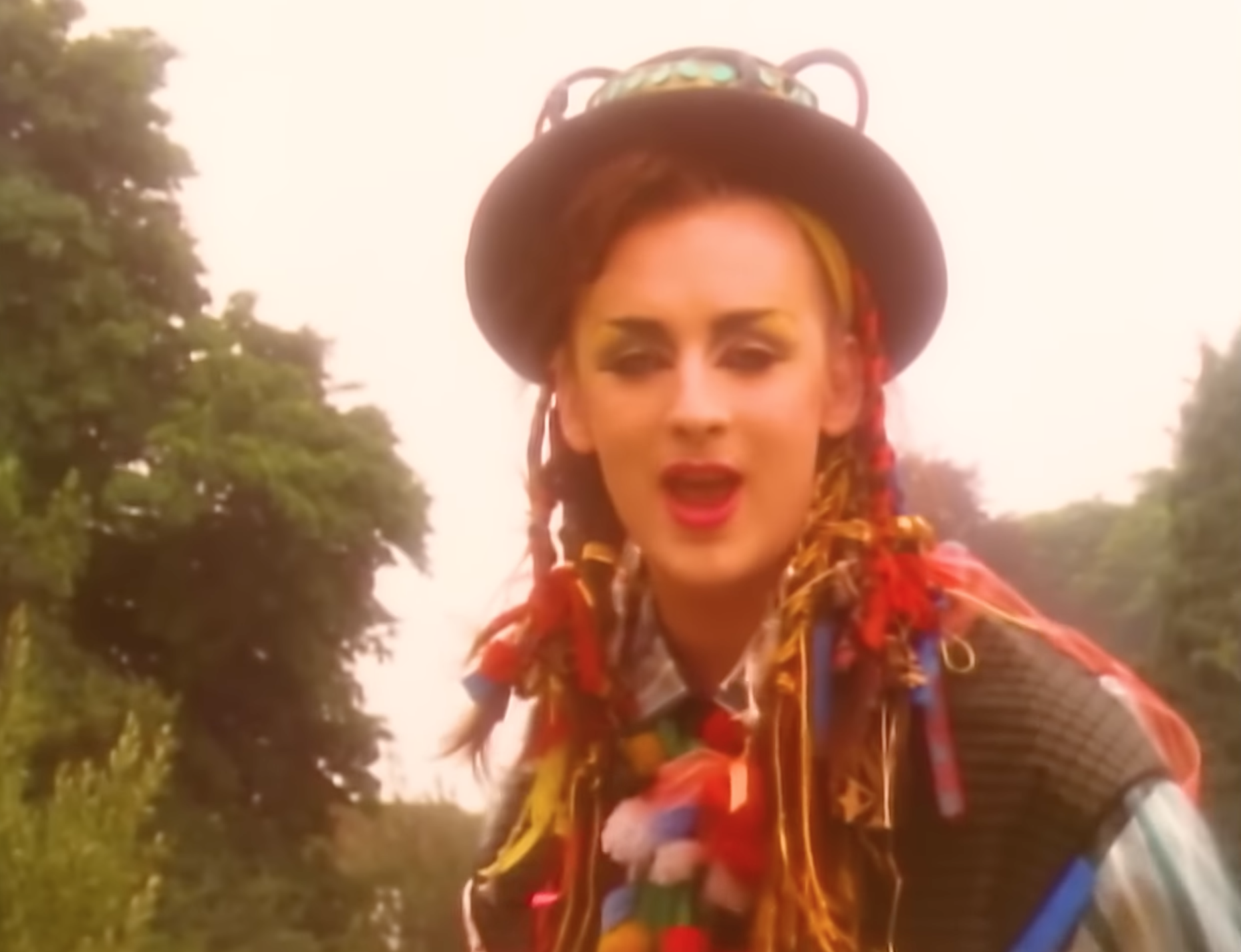 Boy George singing in the Karma Chameleon video