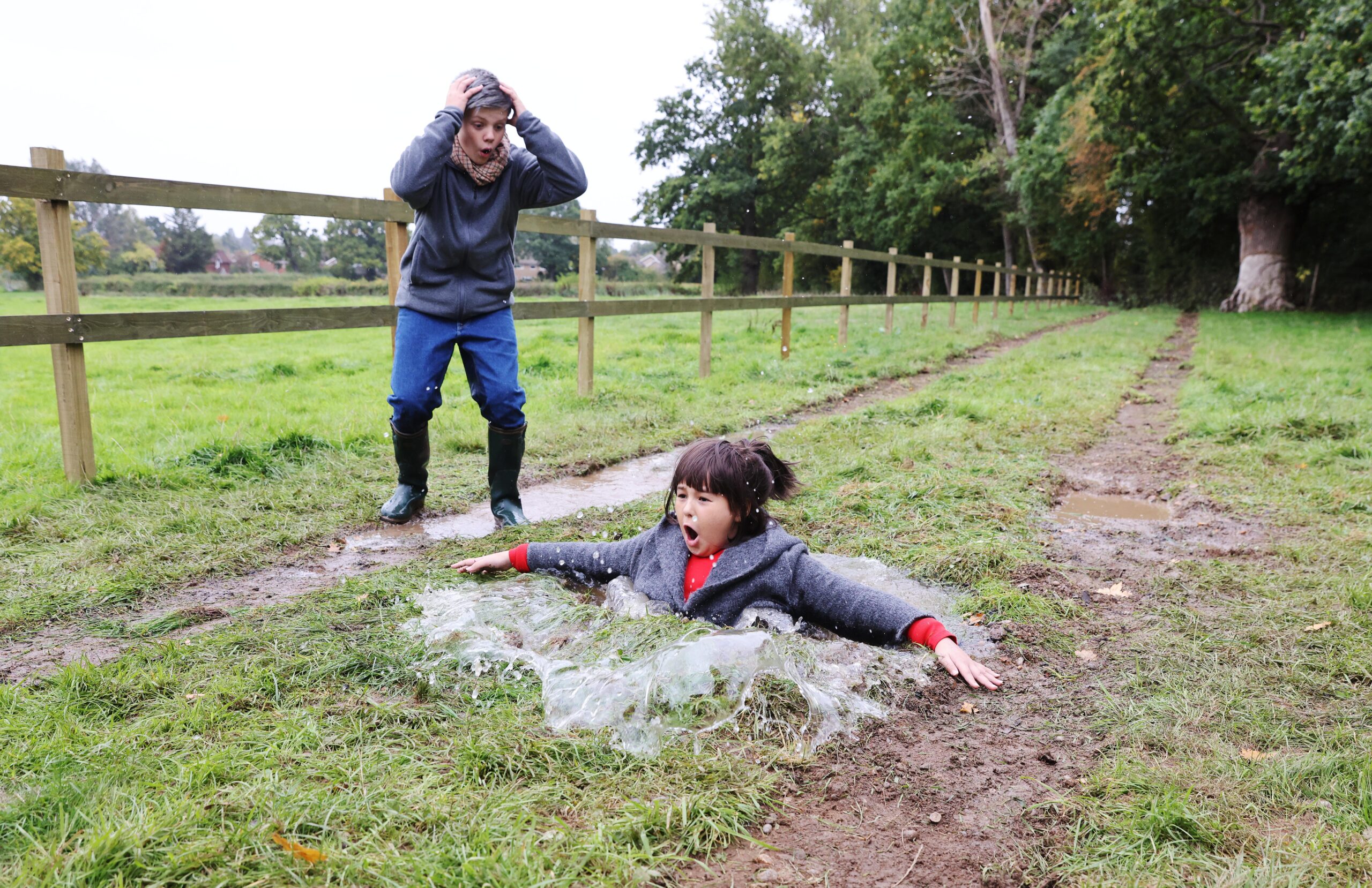 Child falling in a puddle like Vicar of Dibley scene