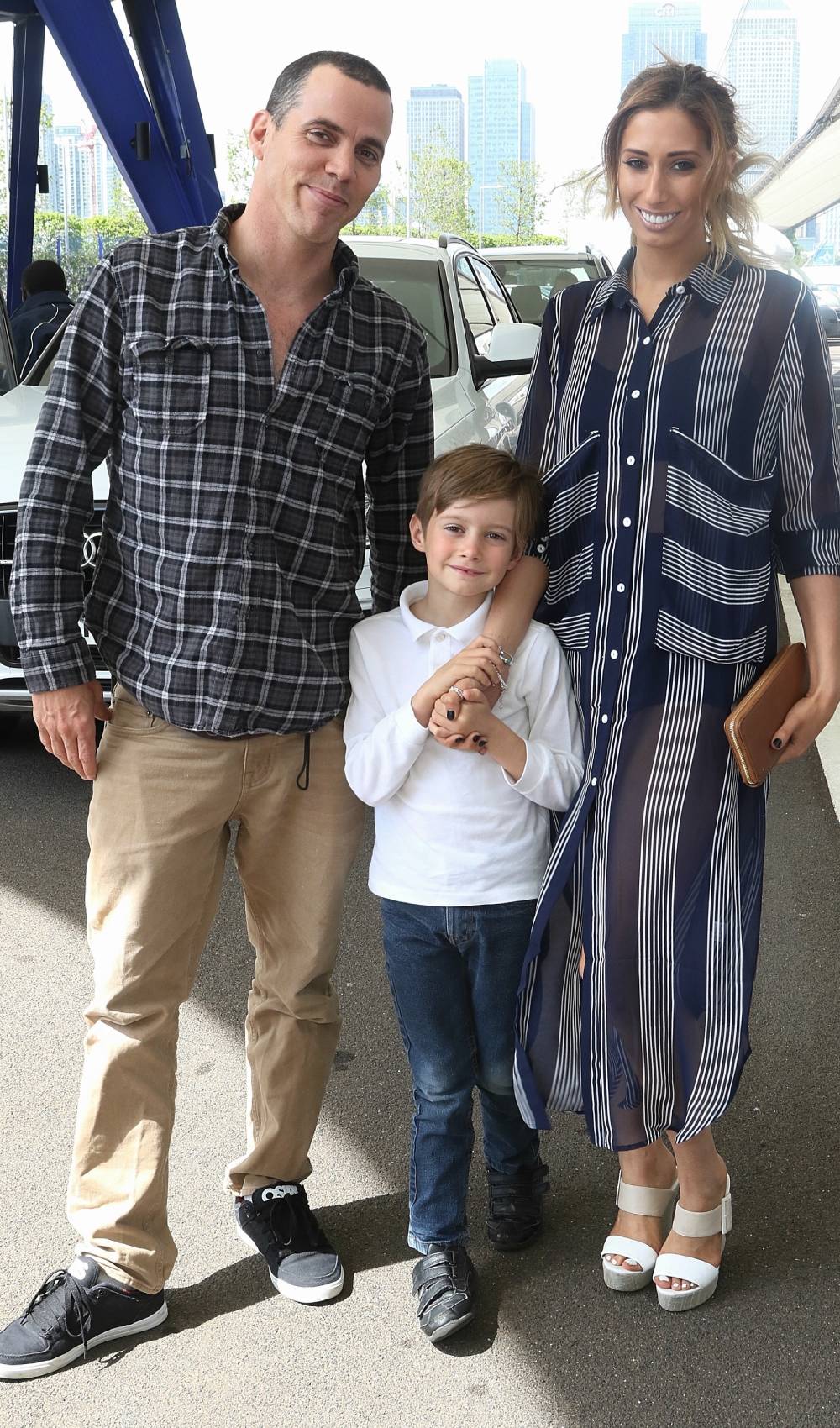 Stacey Solomon stands with Steve-O and her son Zachary