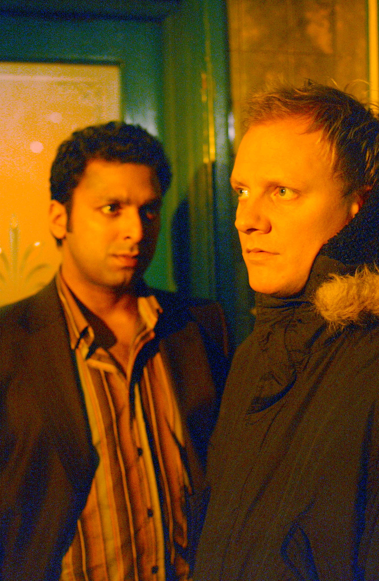 Sonny Dhillon looking at Sean in Corrie 