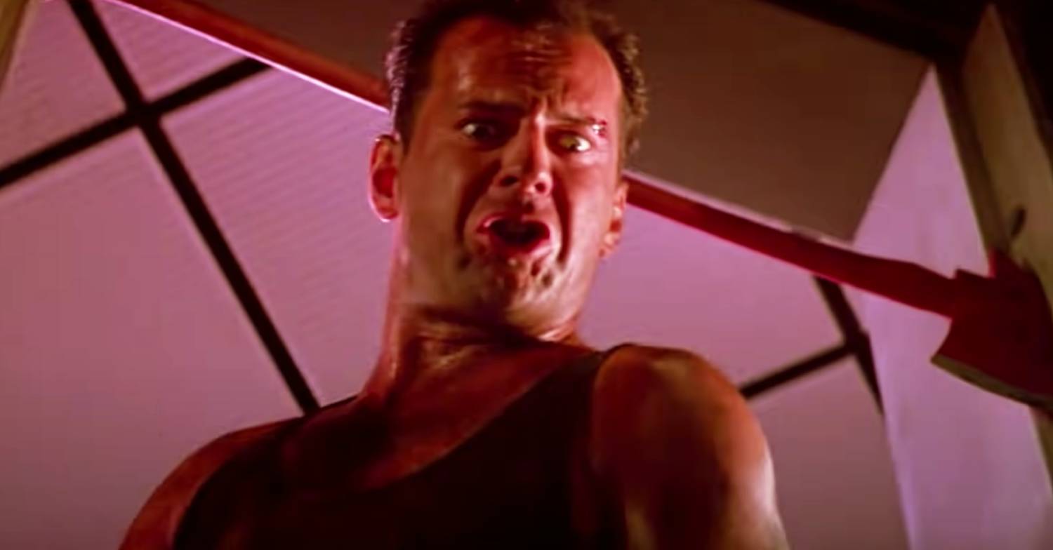 Bruce Willis looking scared in Die Hard
