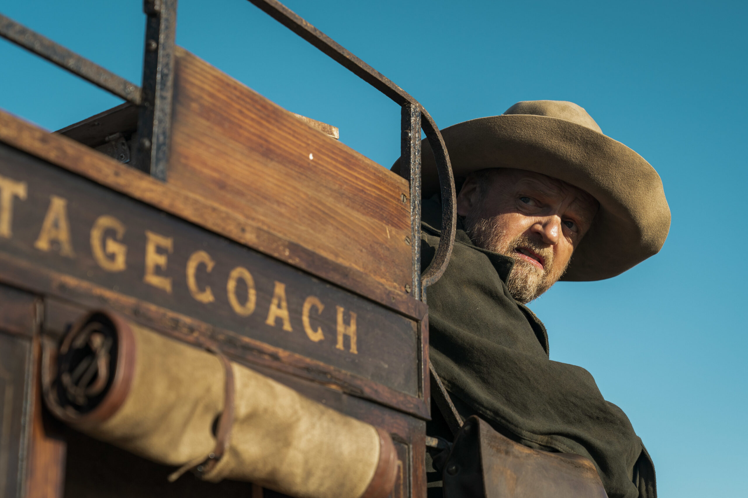 Cusk looks out of wagon in The English