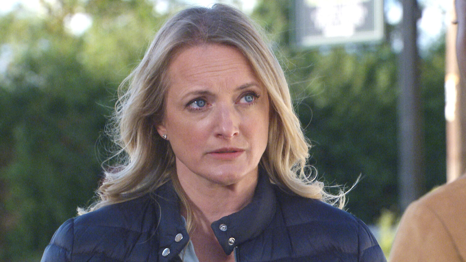 Nicola looks shocked as she listens to Naomi talk on Emmerdale