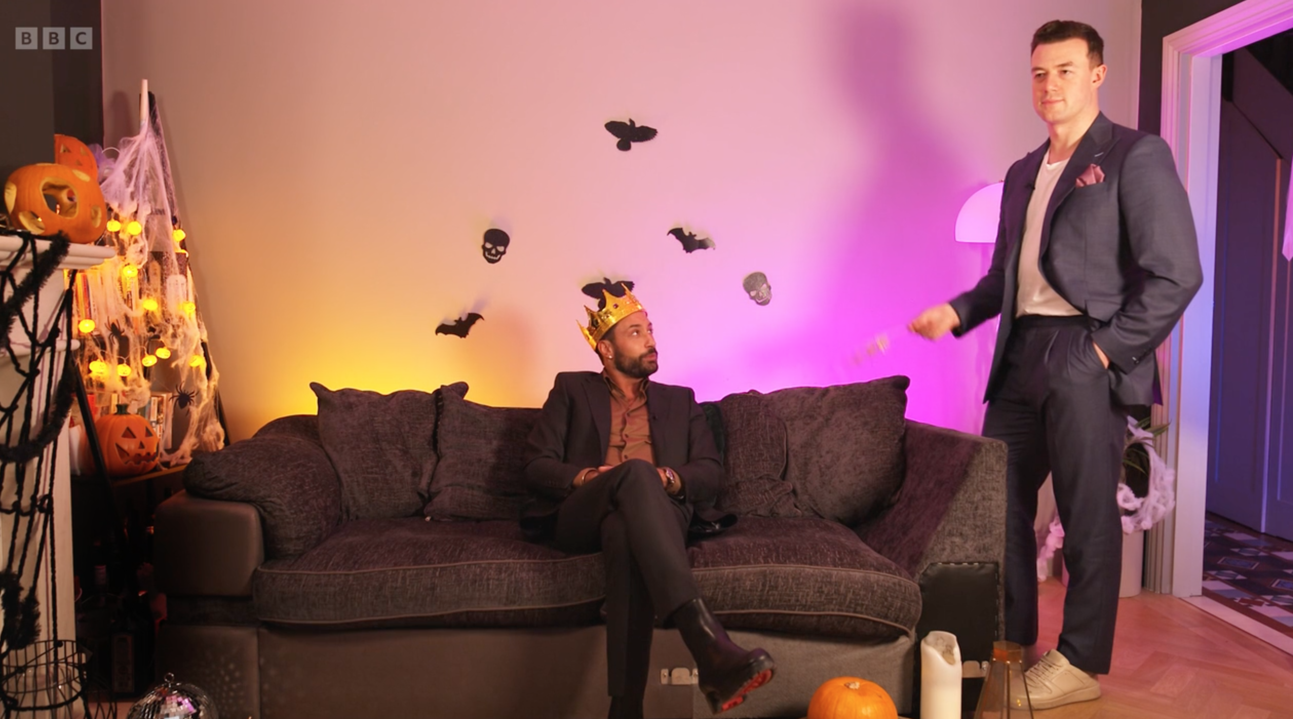 Strictly star Giovanni Pernice sitting on his sofa