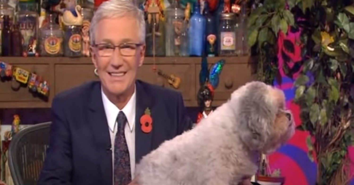 Paul O'Grady smiling with his dog Buster who he paid Instagram tribute to