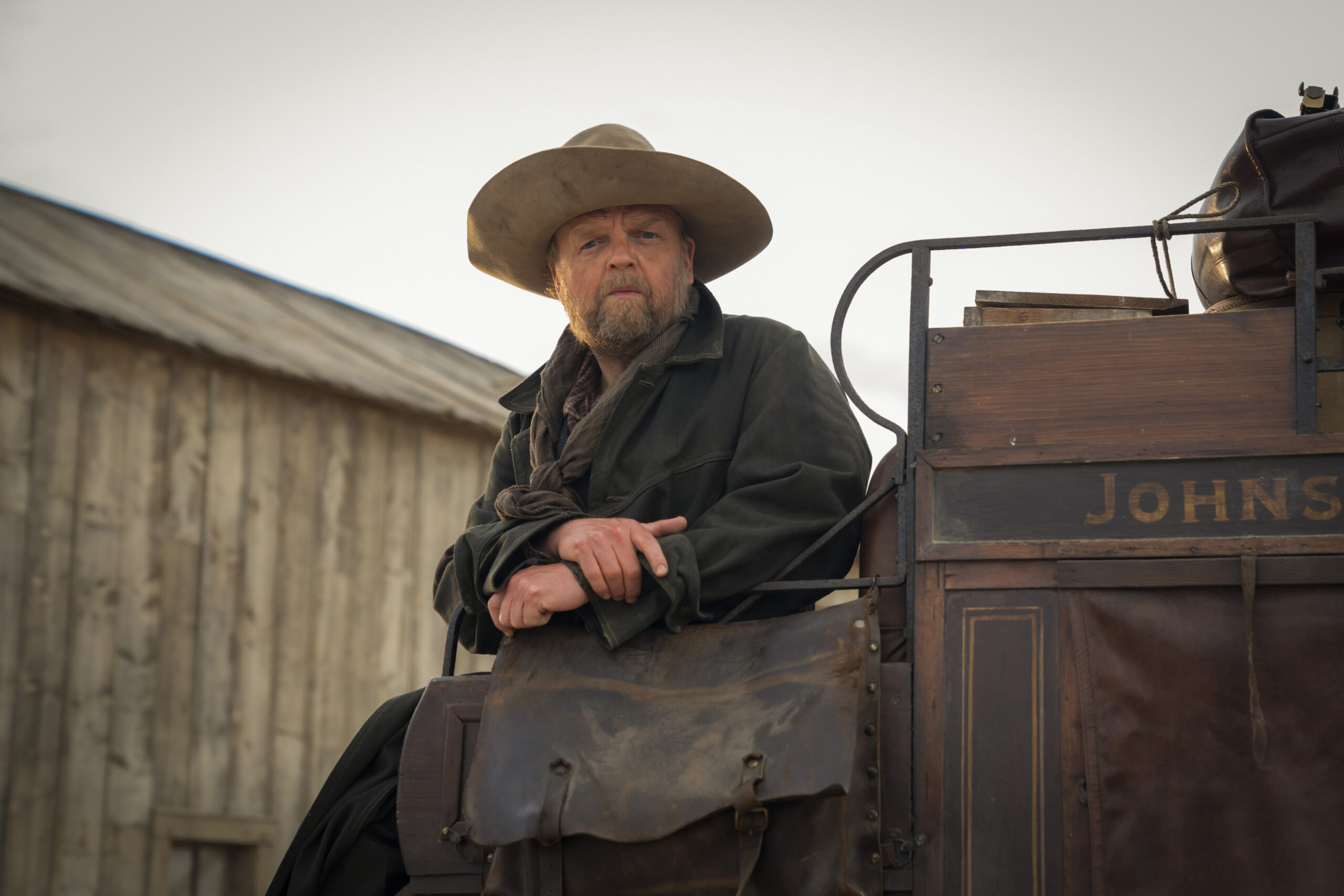 Sebold Tusk sits in his wagon