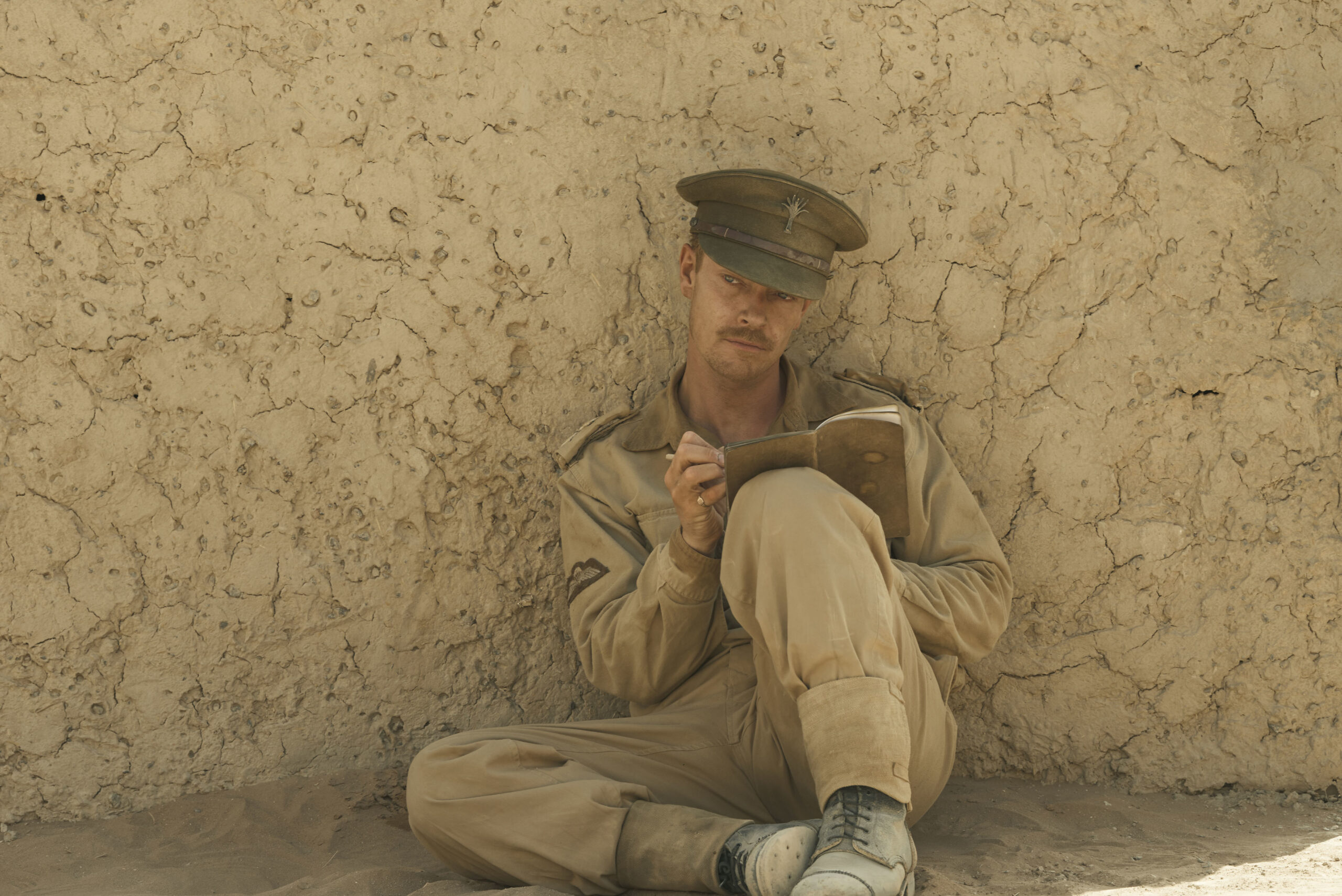 Jock Lewes writing in his journal in SAS Rogue Heroes