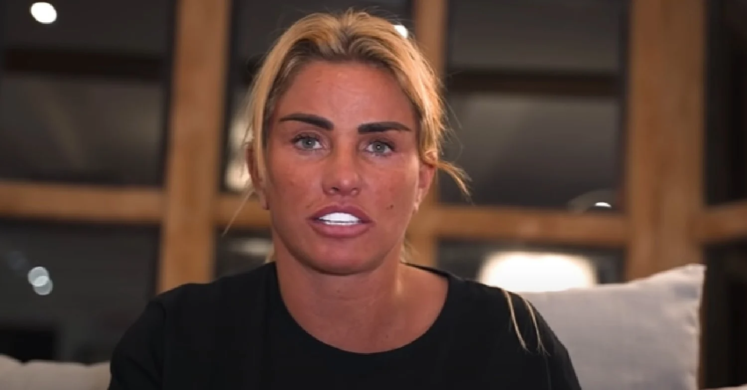 Katie Price showing her white teeth to camera