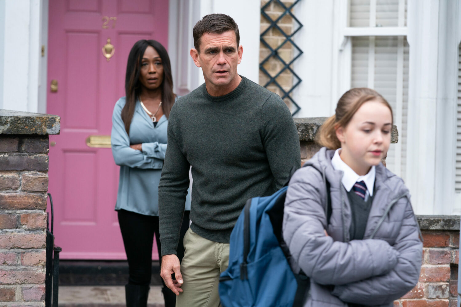 Jack looking worried at Amy as Denise folds her arms 