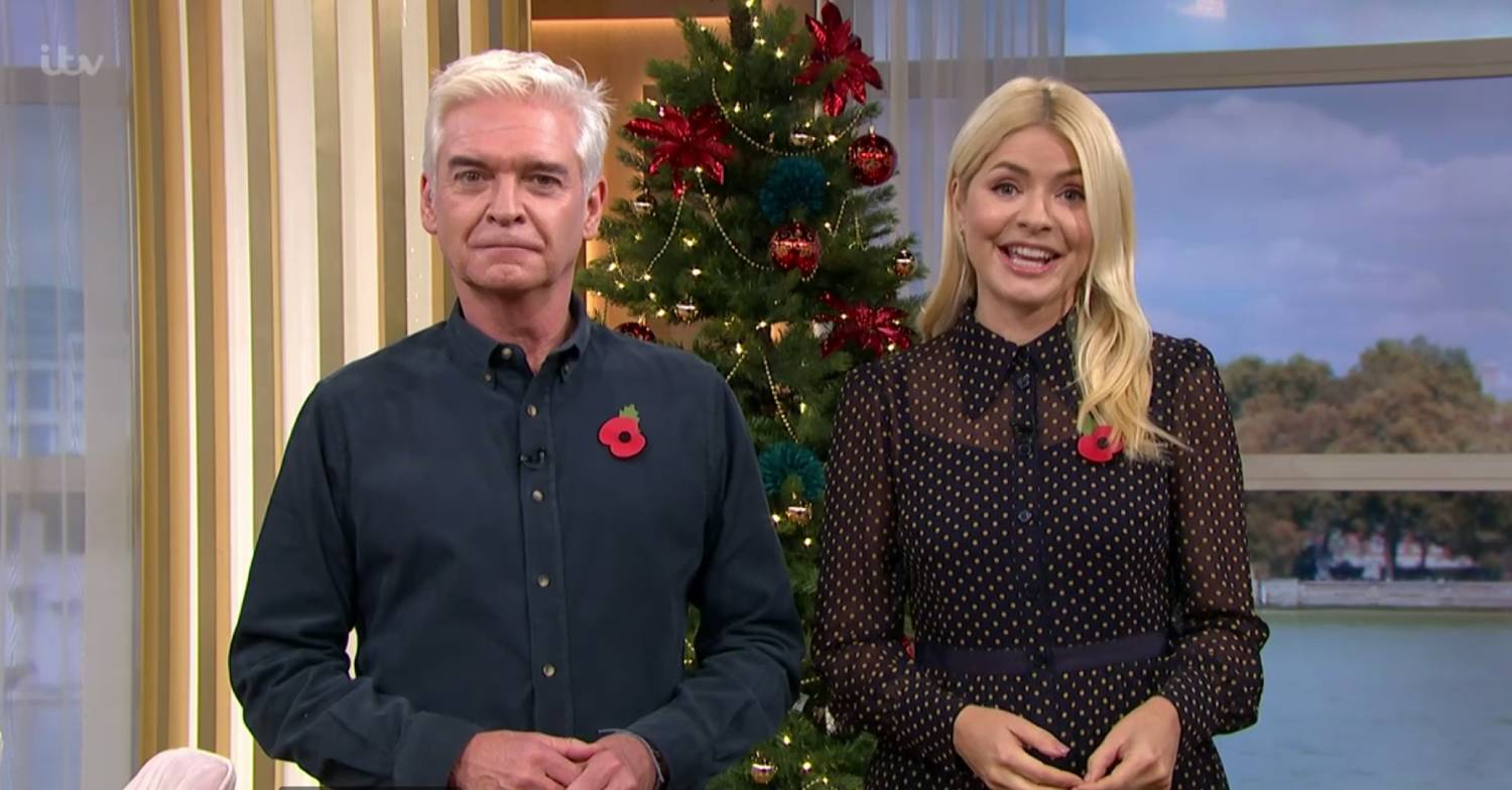 Phillip Schofield and Holly Willoughby stand in front of a Christmas tree on This Morning today