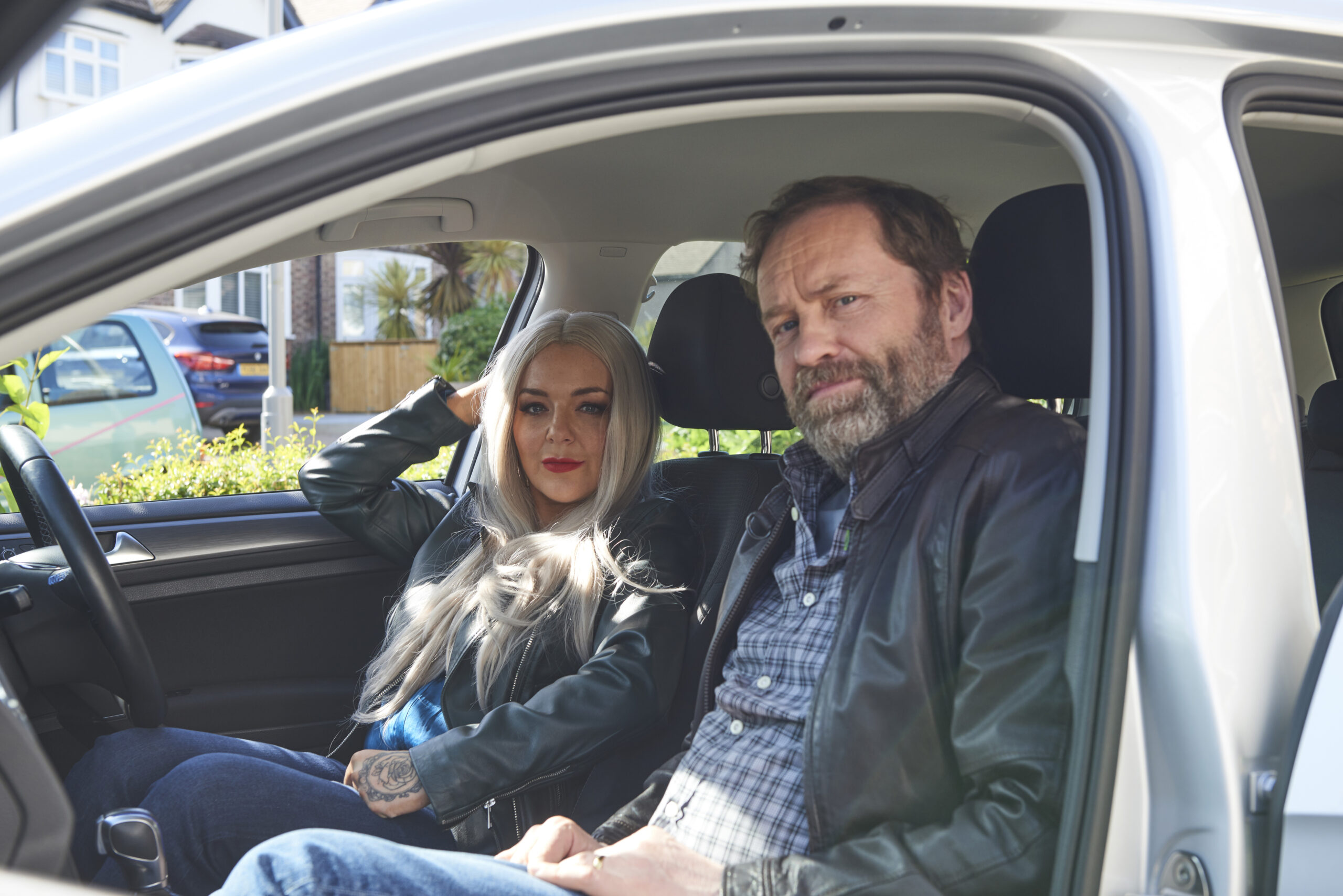 Rosie and Conal sit in a car in Rosie Molloy Gives Up Everything