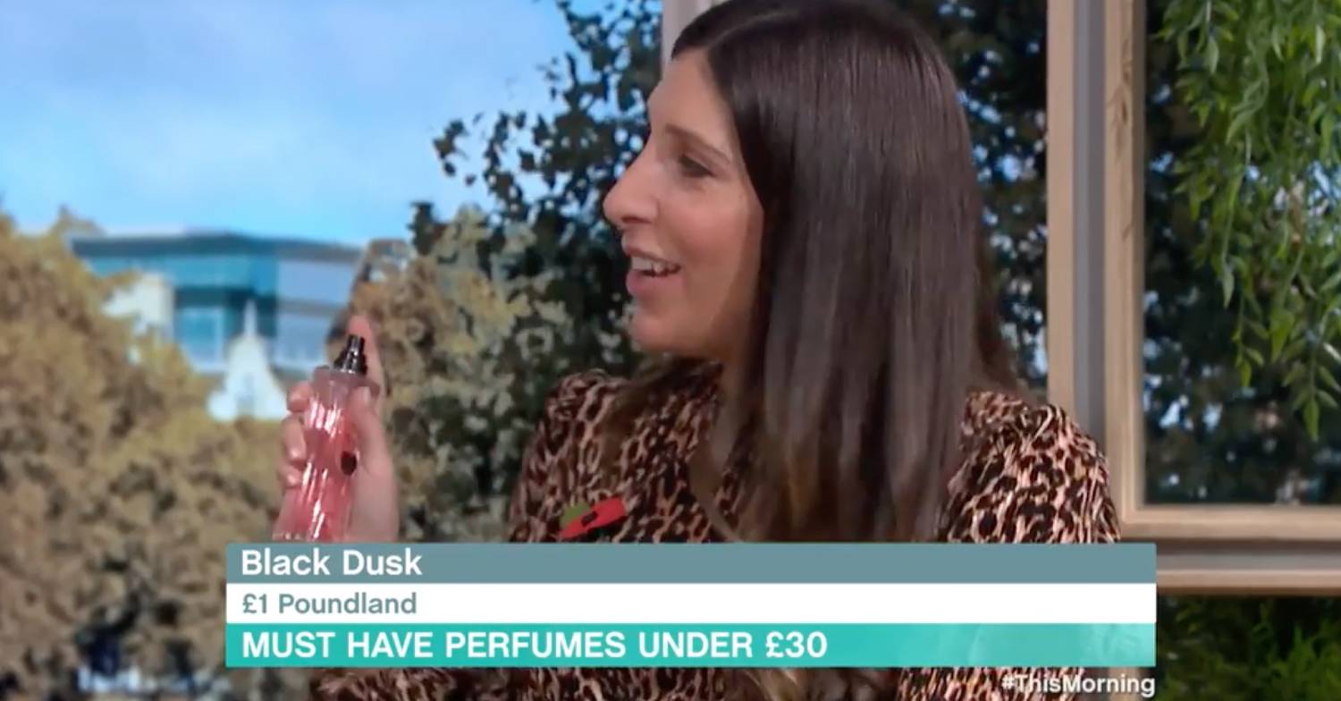 Sarah Jossel spraying a perfume bottle on This Morning