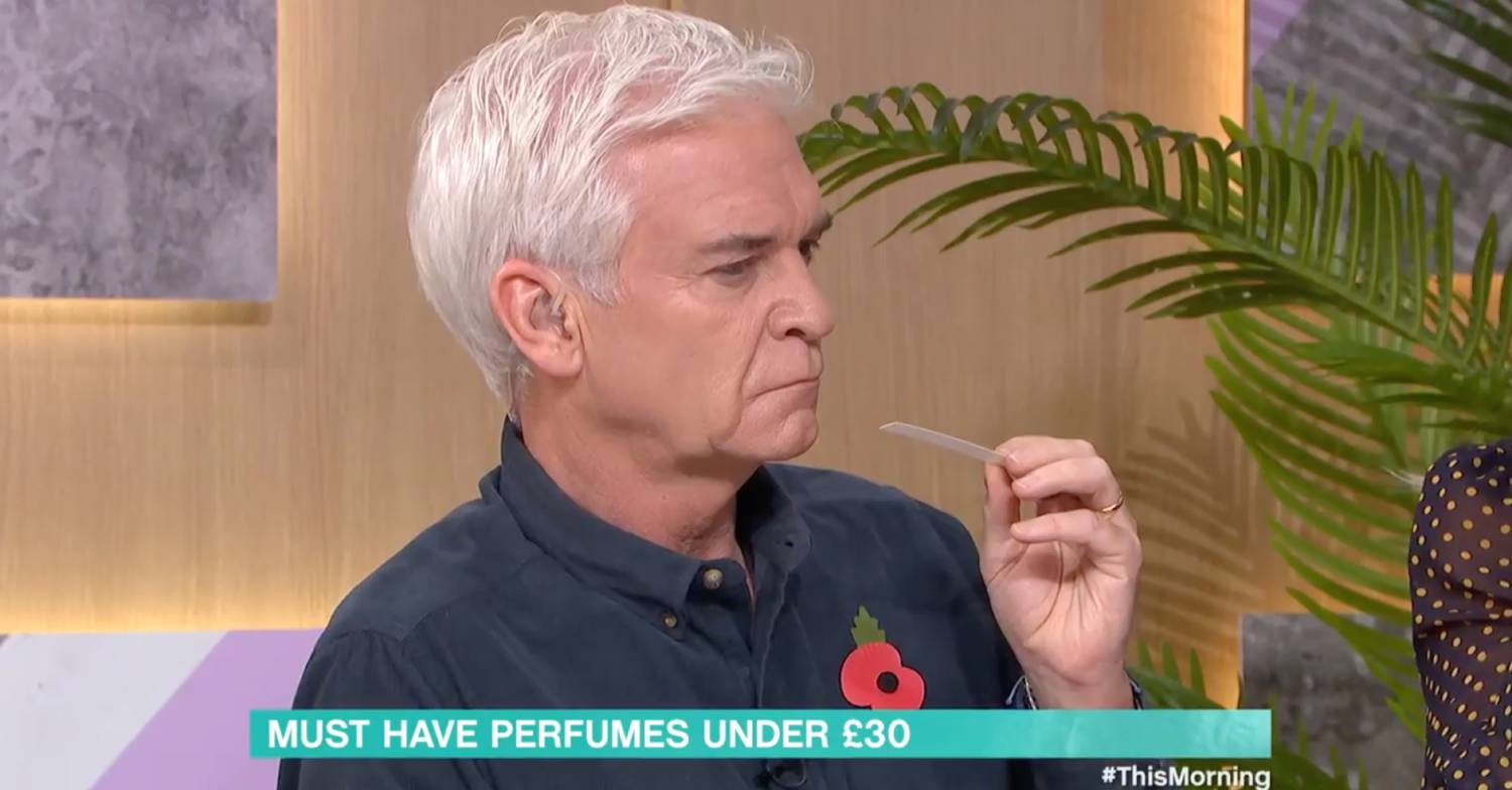 Phillip Schofield has a sniff of perfume on This Morning