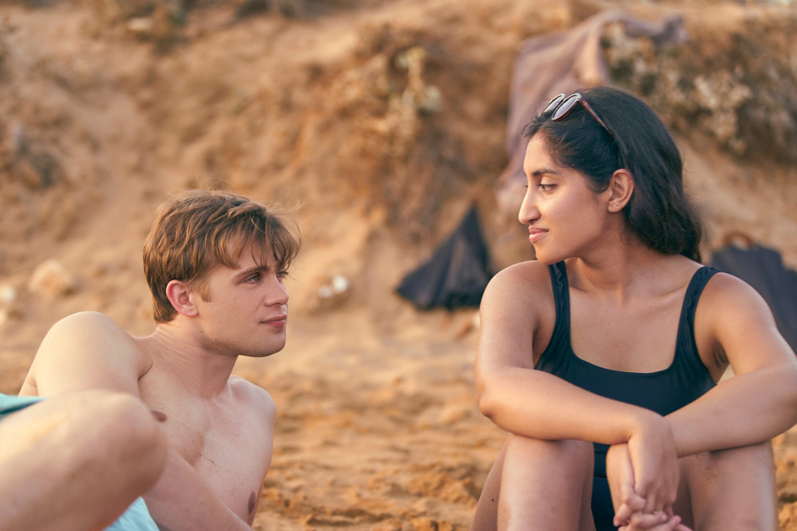 Leo Woodall and Ambika Mod gaze into each other's eyes in promo shot for One Day