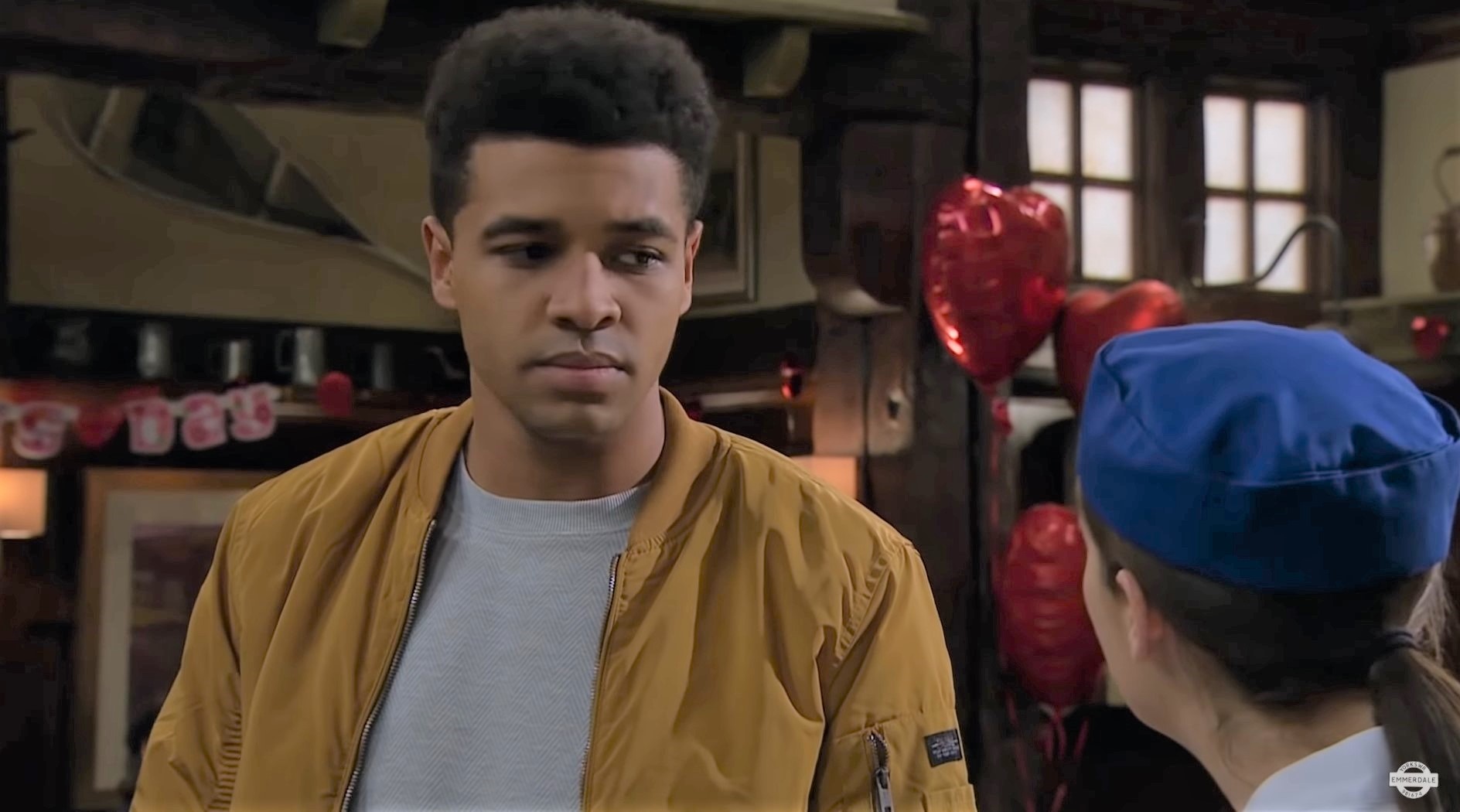 Ellis Chapman in Emmerdale looks annoyed with Victoria in the Woolpack