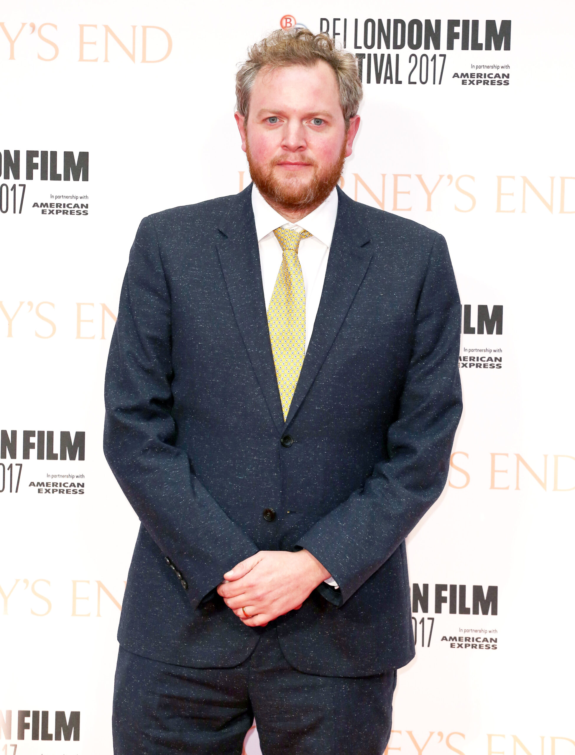 Miles Jupp posing on the red carpet