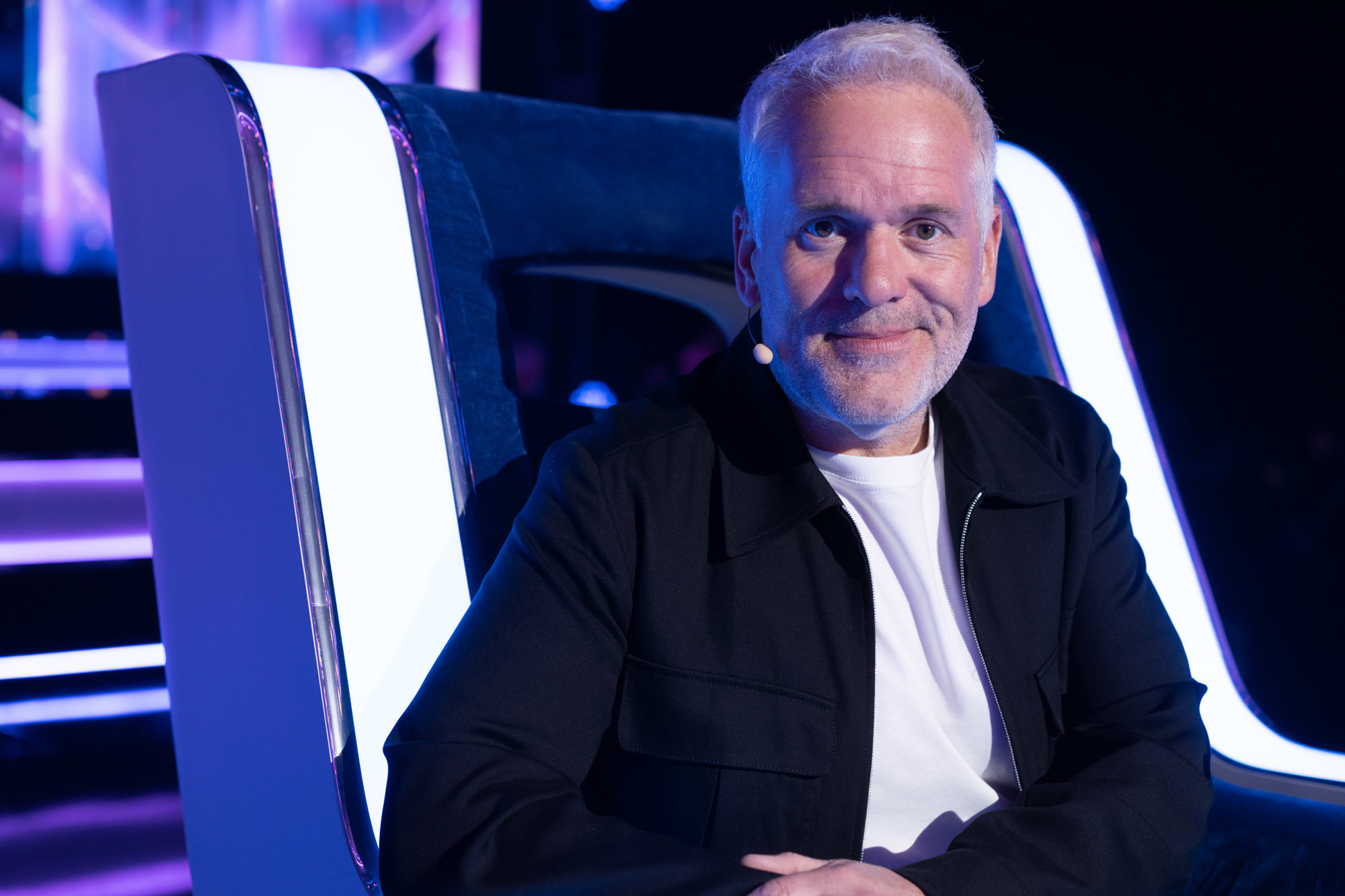 Chris Moyles smiling on The Wheel