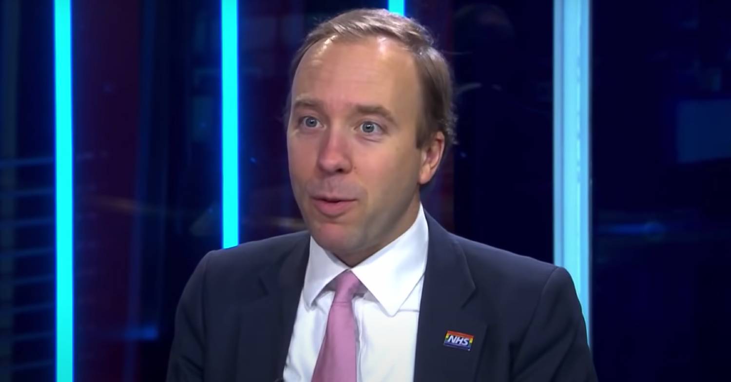 Matt Hancock responds to a question wearing a suit and tie