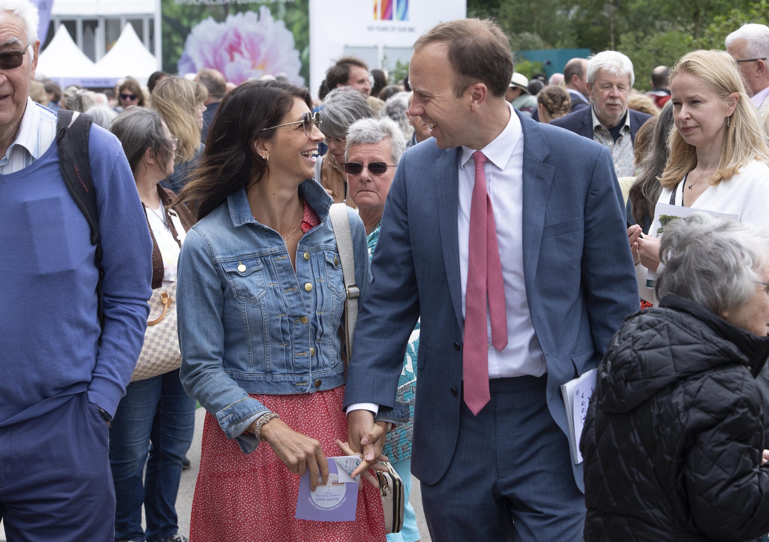 Matt Hancock holding hands with his new girlfriend smiling