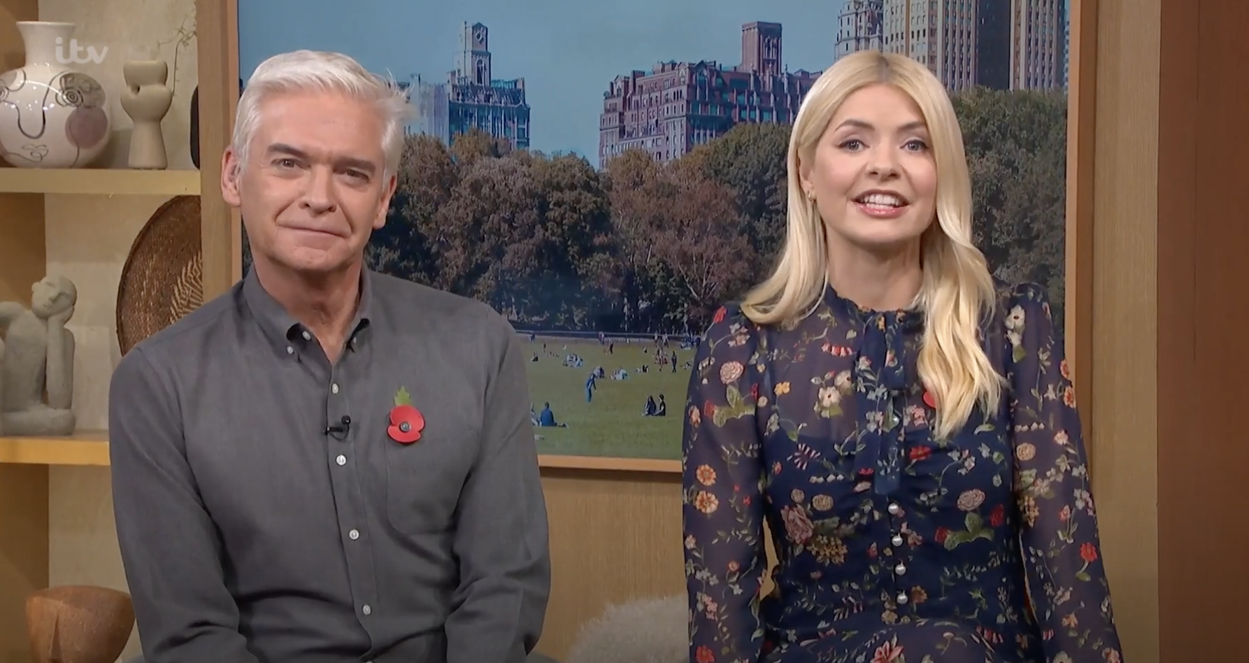 Holly Willoughby, in floral dress, and Philip Schofield smiling on This Morning