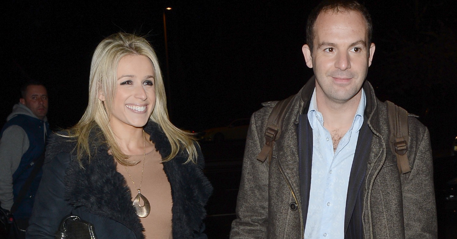 Martin Lewis holding hands with his wife, Lara