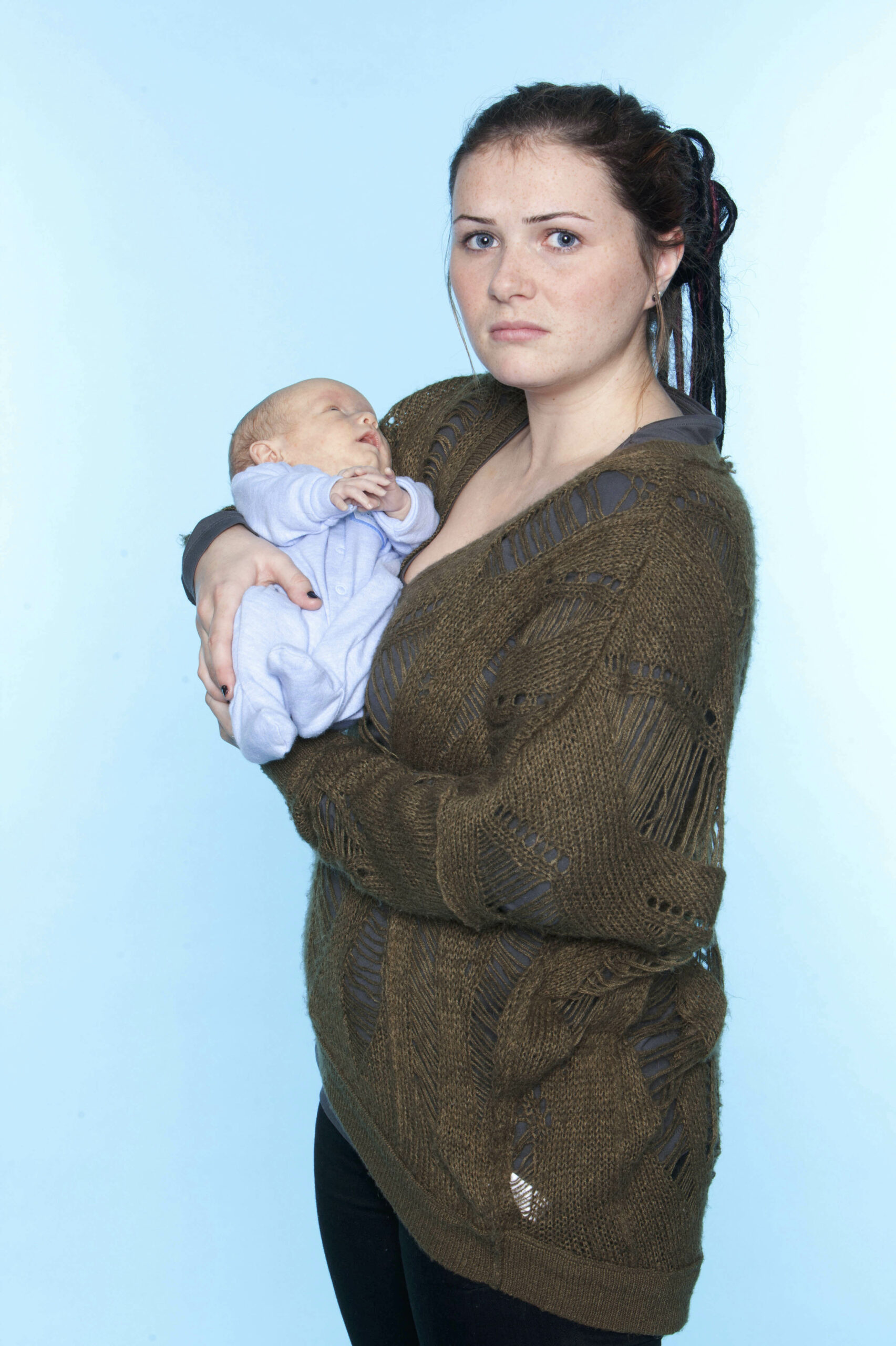 Amy looking worried holding Kyle in Emmerdale