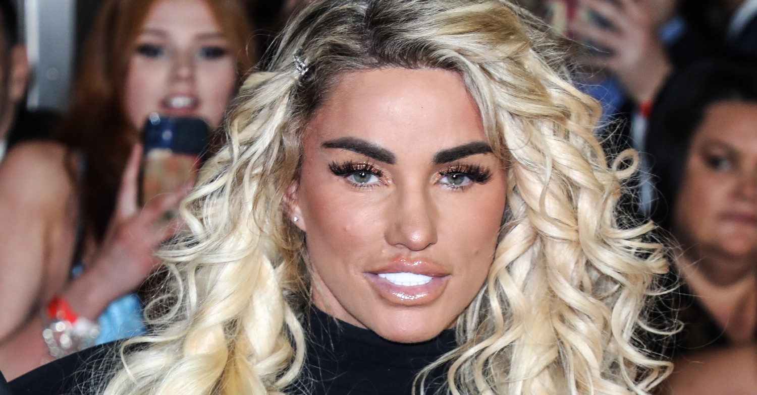 Katie Price at the NTA ceremony smiling with curly hair