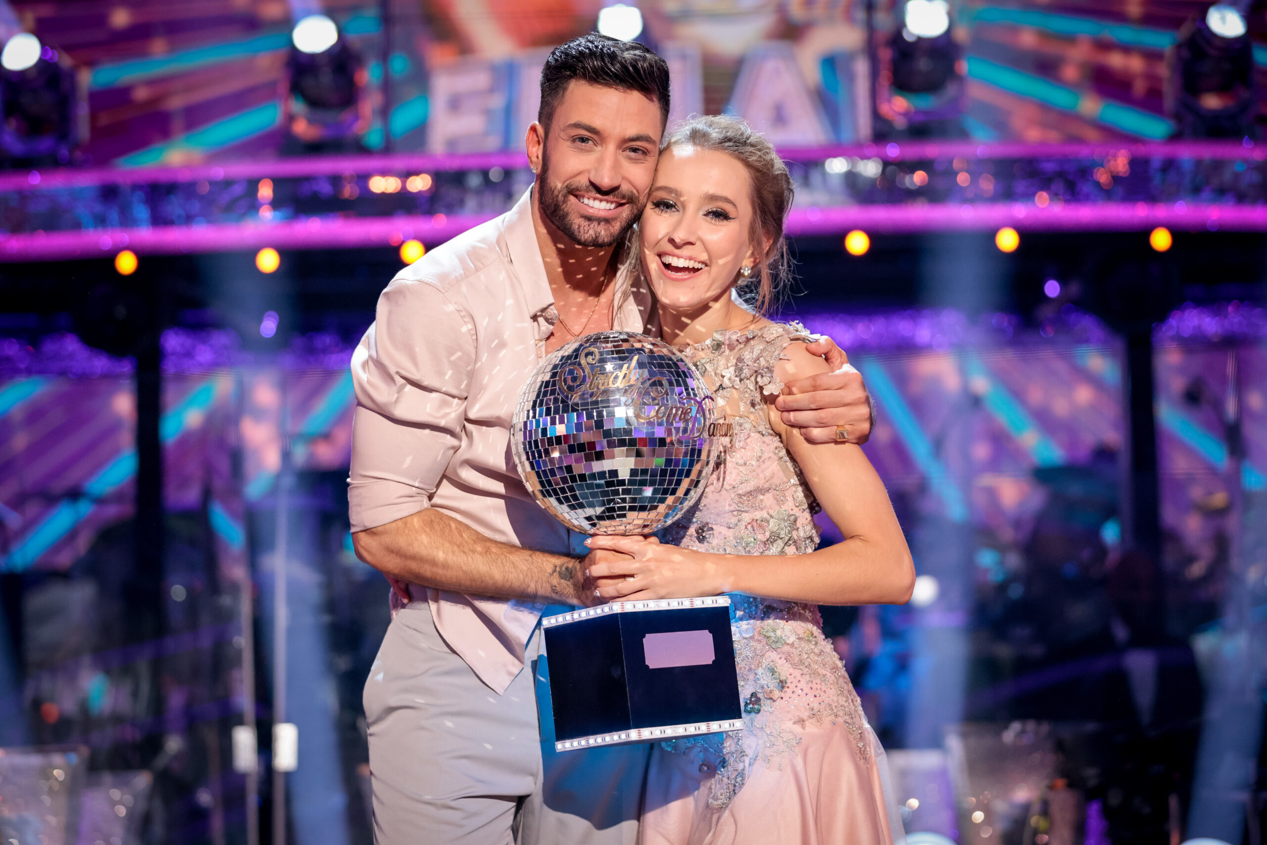 Strictly stars Giovanni and Rose posing with their trophy